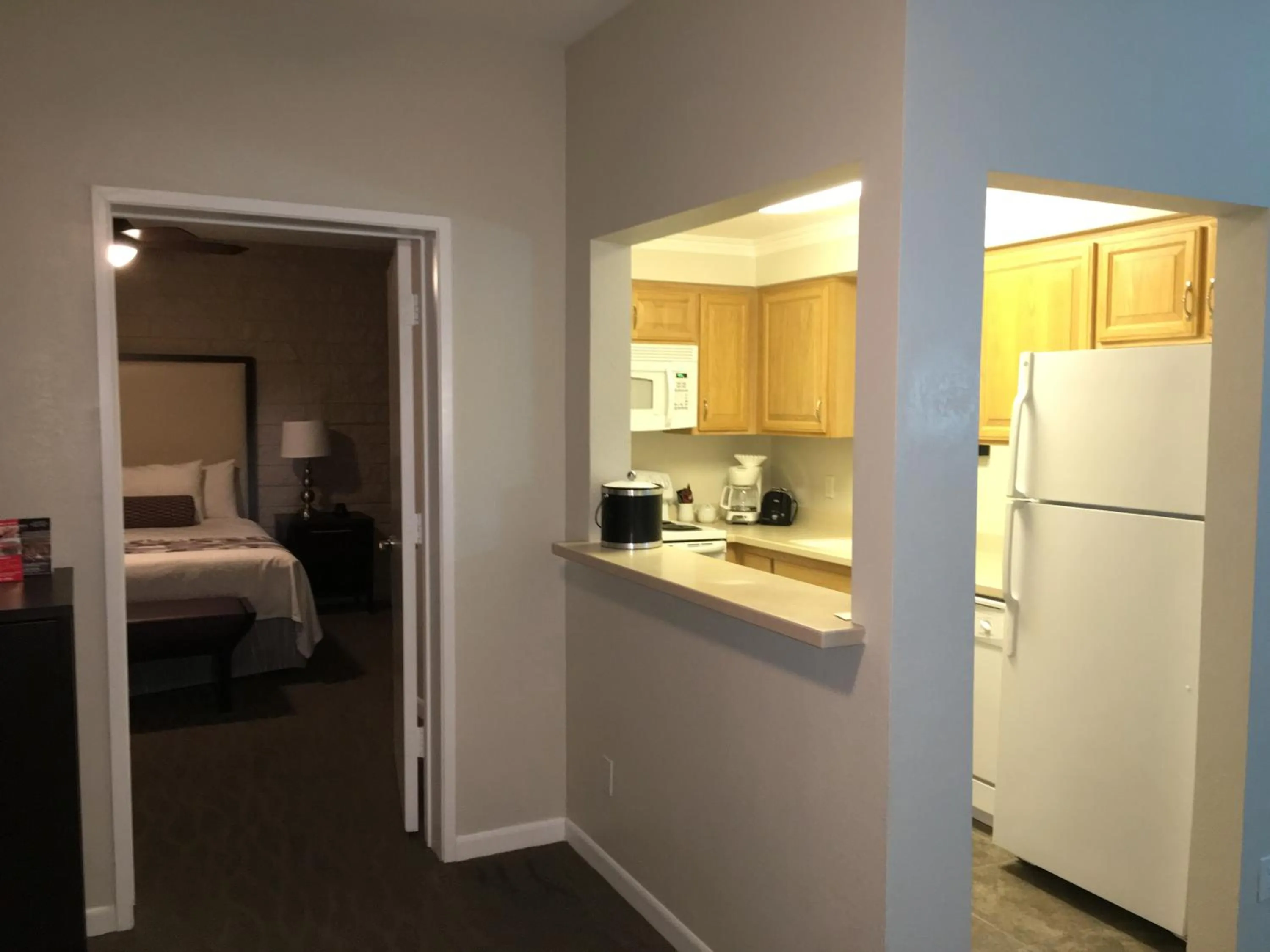 Kitchen or kitchenette, Bed in GetAways at Palm Springs Tennis Club