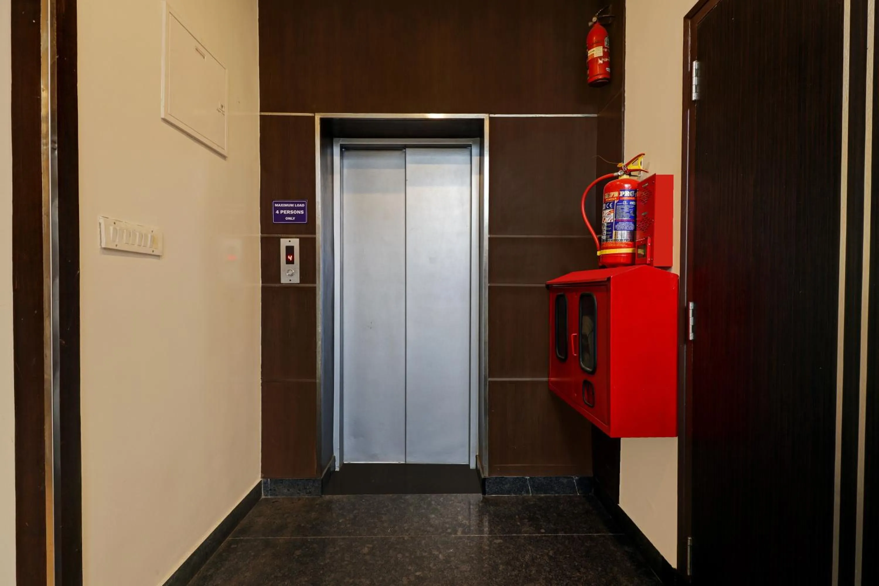 elevator in Treebo Blueberry Inn