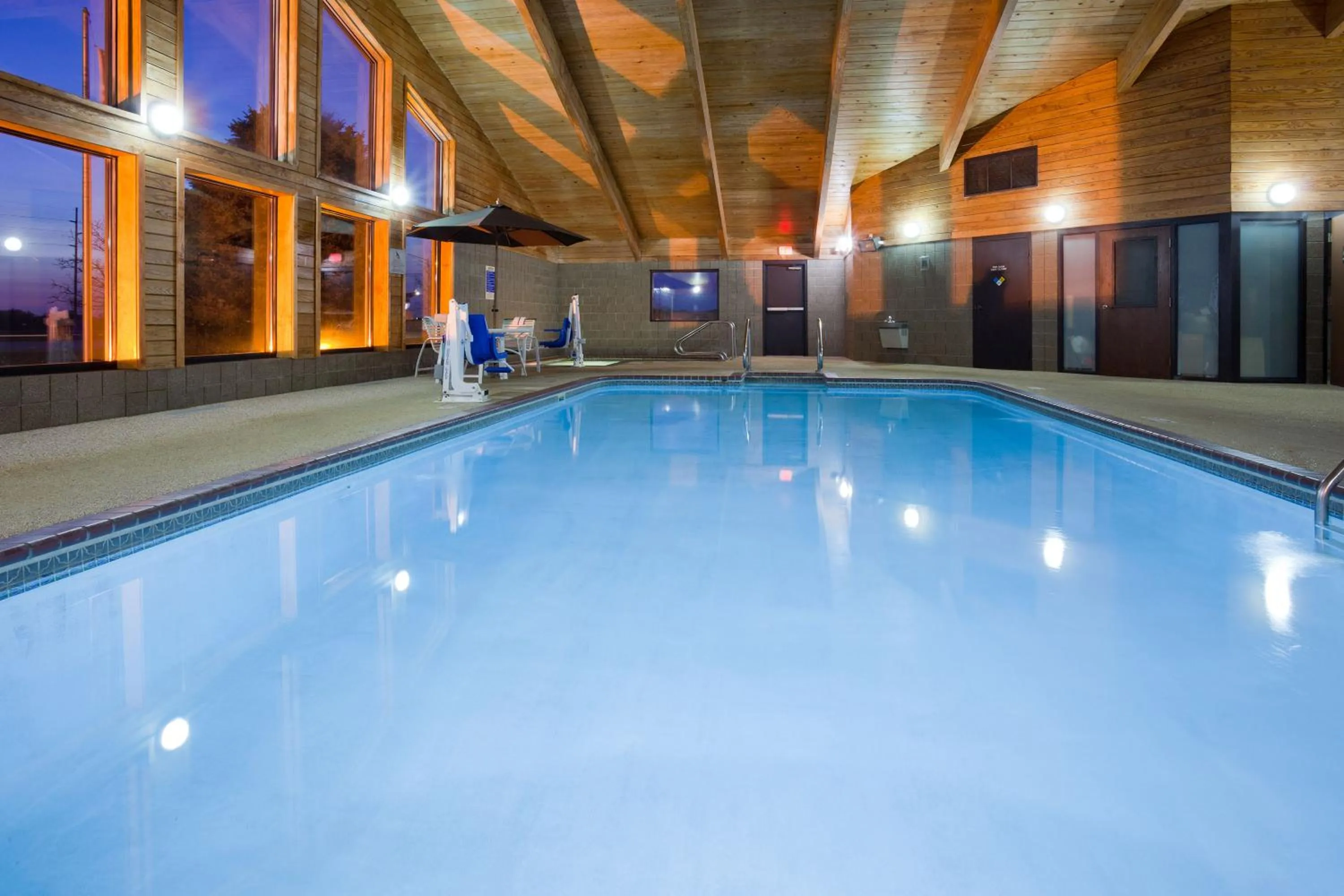 Swimming pool in AmericInn by Wyndham Spencer
