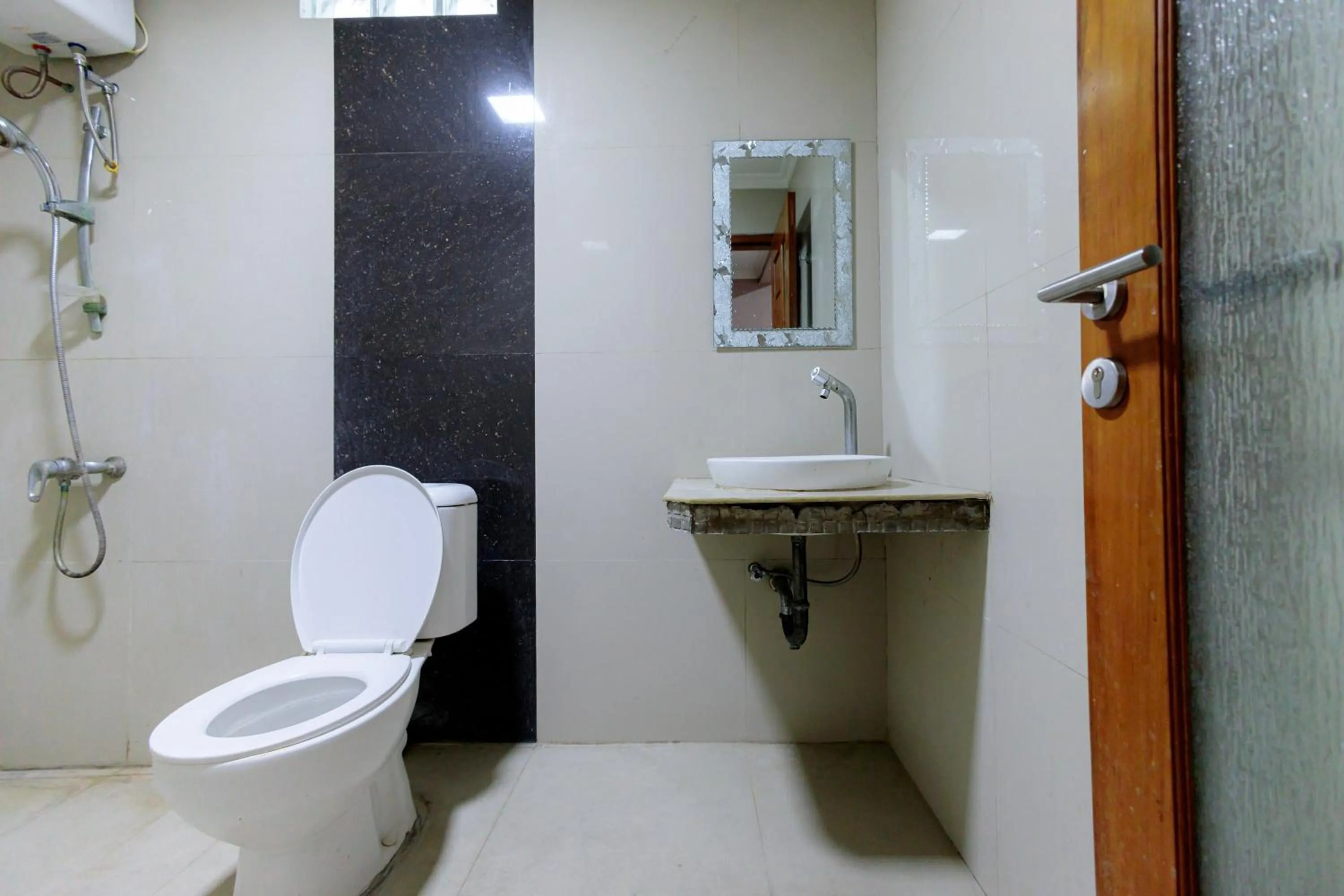 Bathroom in RedDoorz Syariah at Delta Sari Aloha Waru