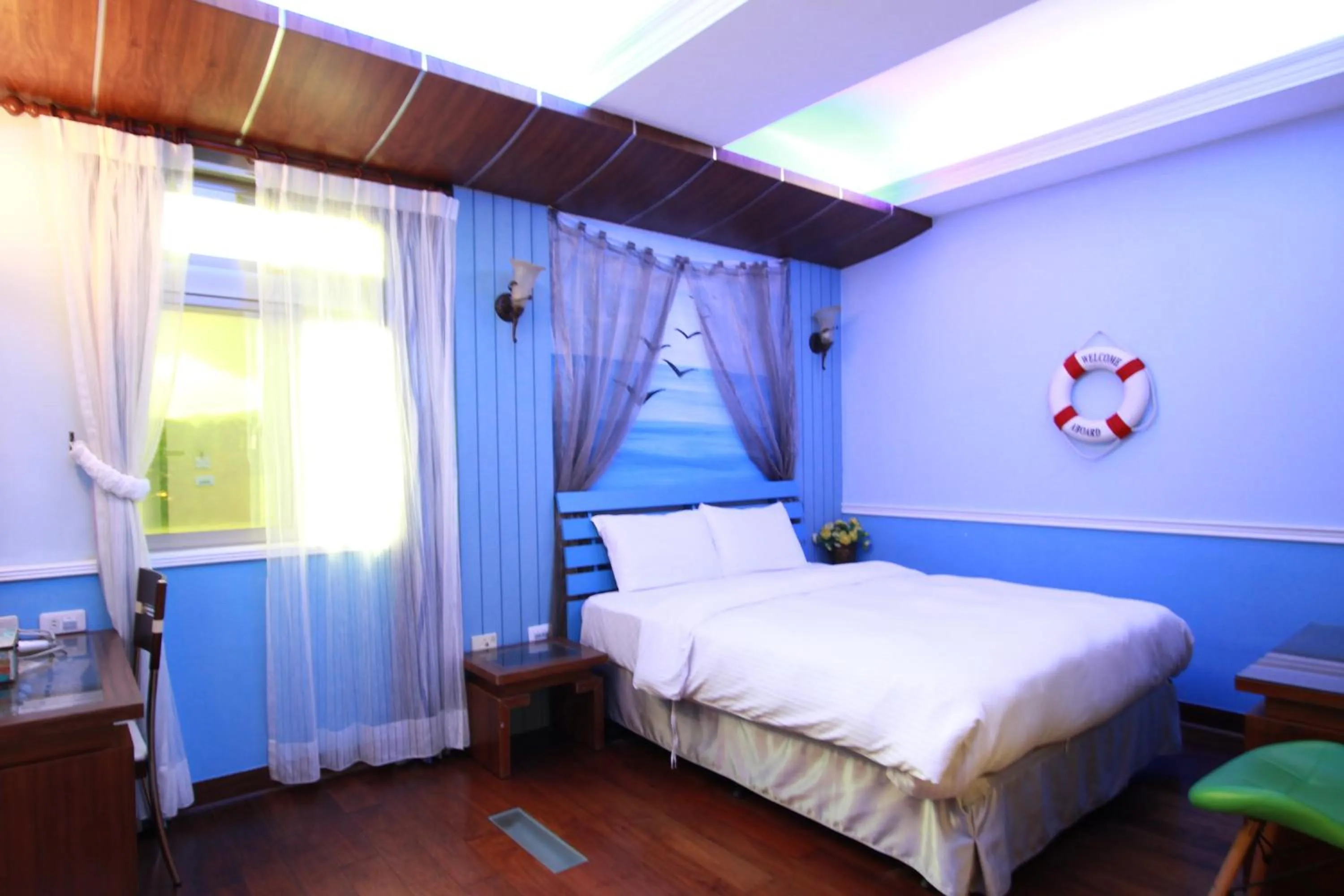 Bed in 墾丁貝殼灣旅店