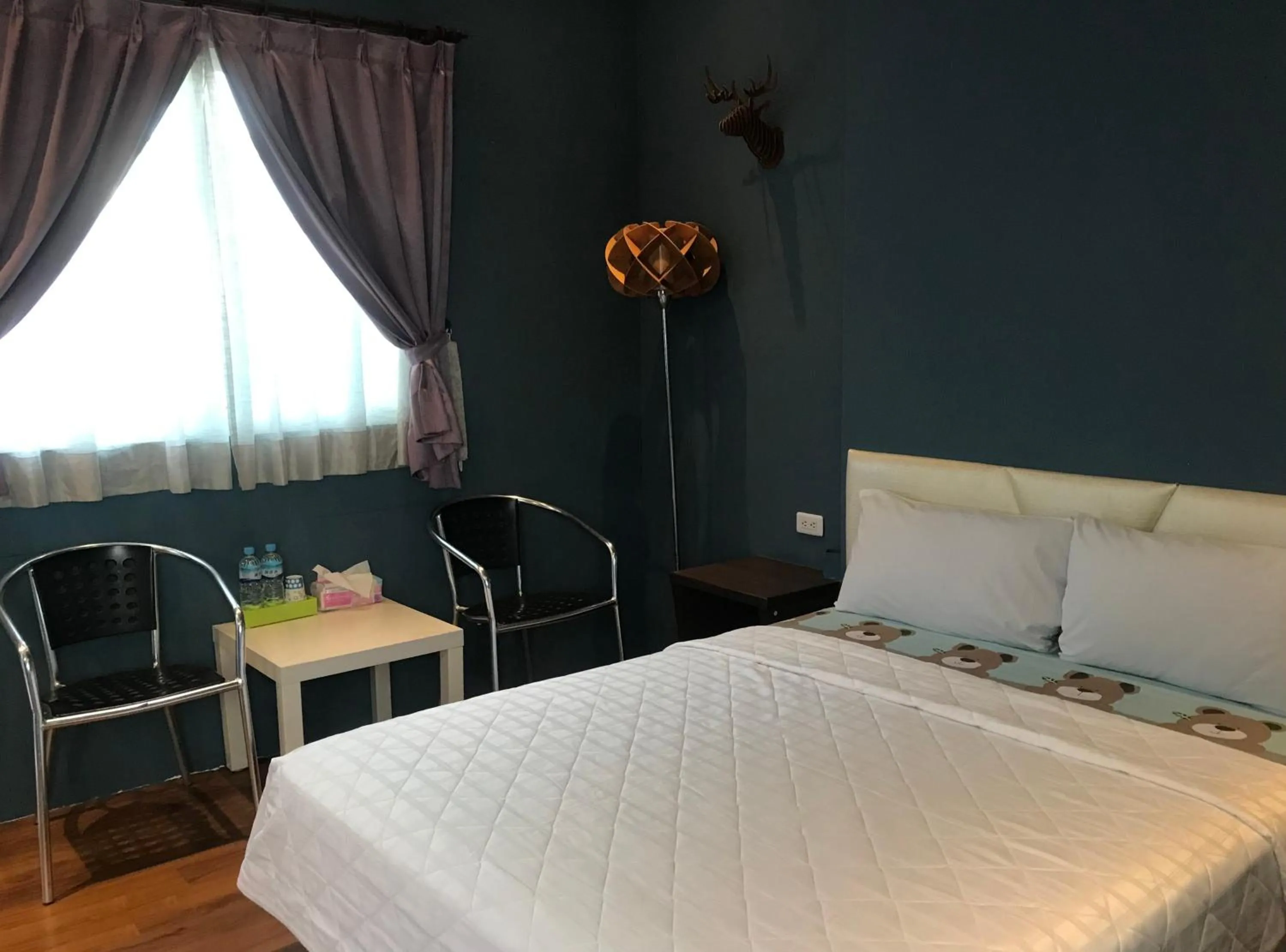 Bed in 墾丁貝殼灣旅店