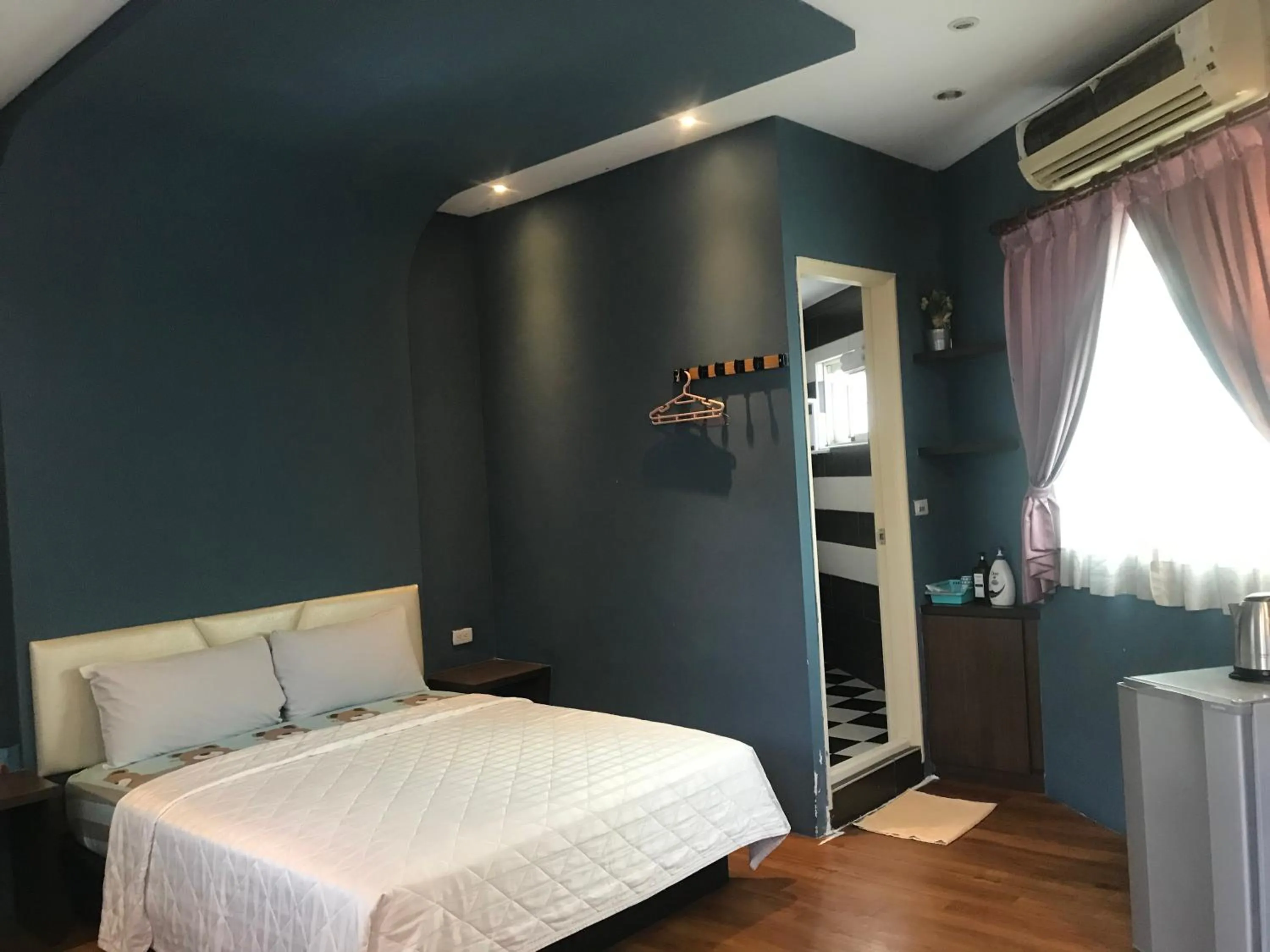 Bed in 墾丁貝殼灣旅店