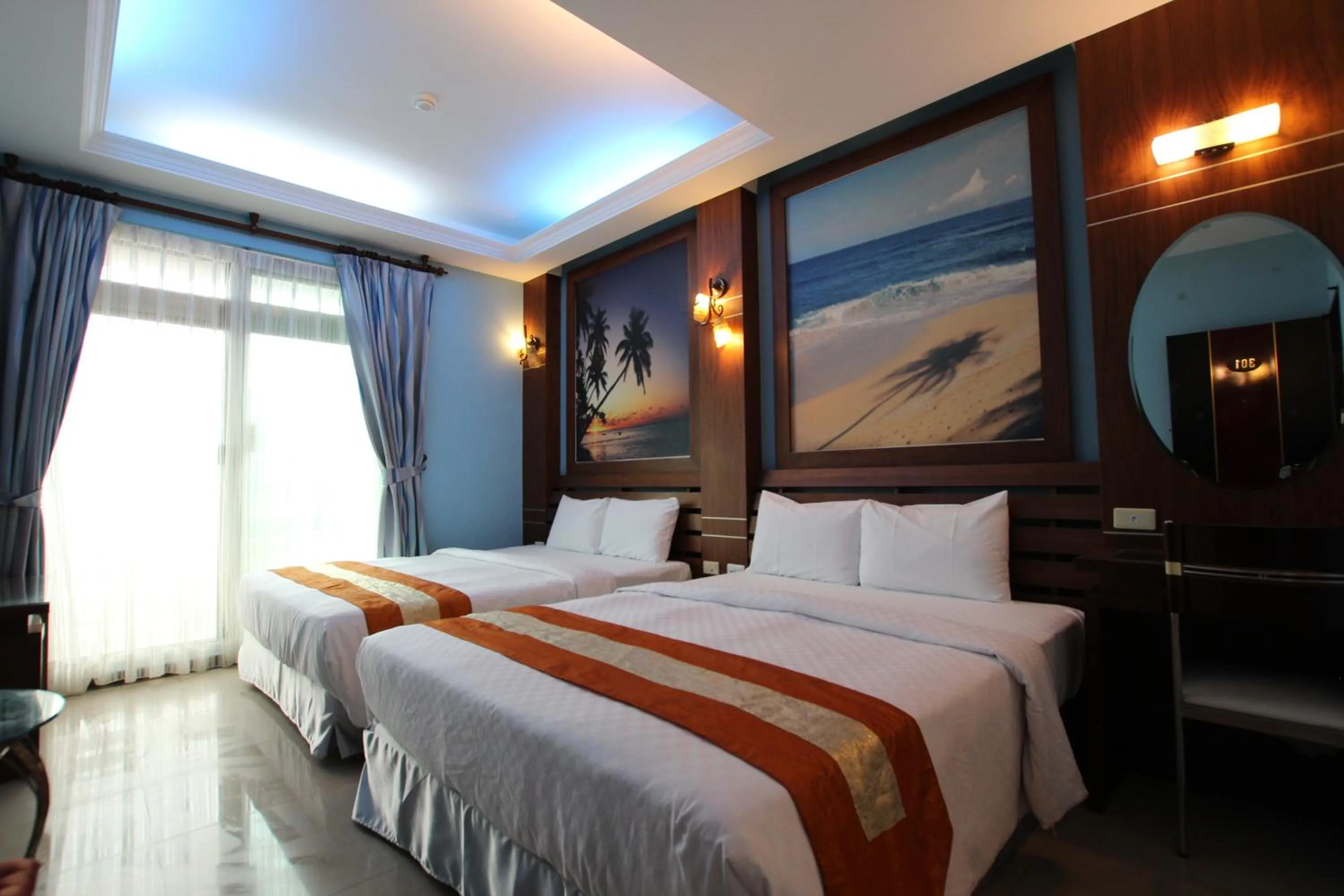 Bed in 墾丁貝殼灣旅店