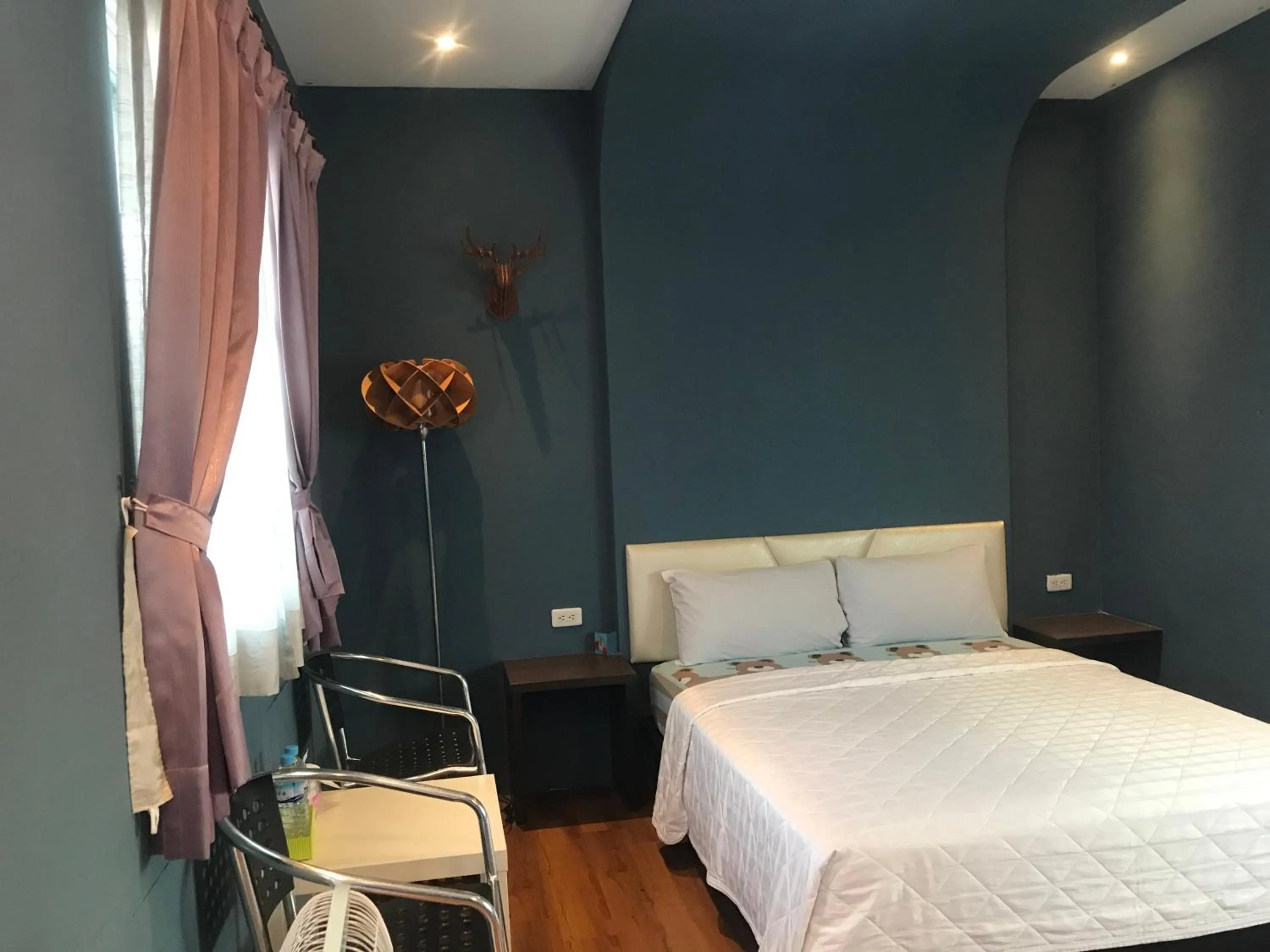 Bed in 墾丁貝殼灣旅店