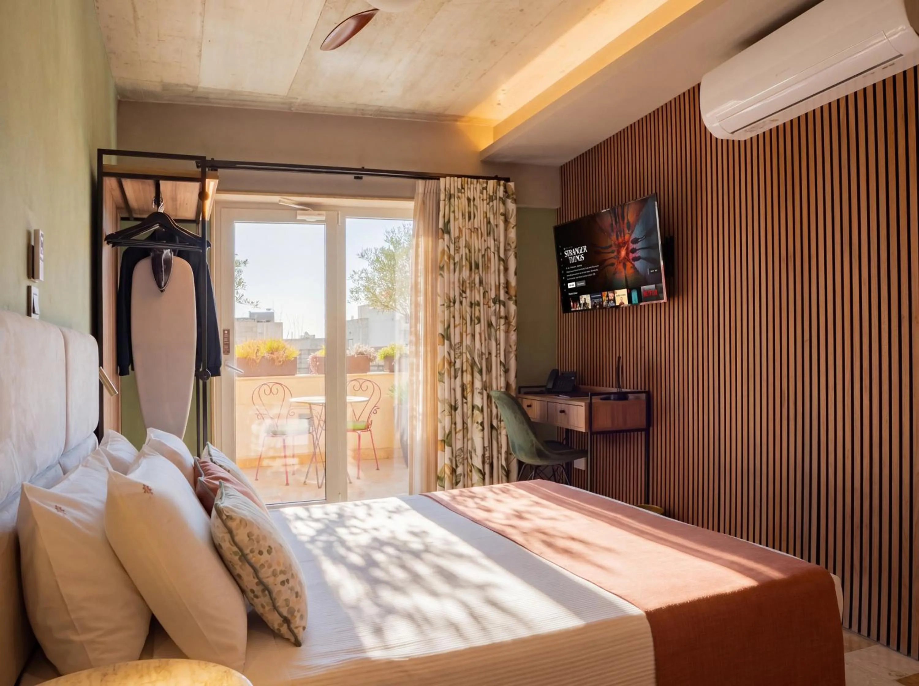Communal lounge/ TV room, Bed in The Mdina Heritage Boutique Hotel - By Luxury Villas International