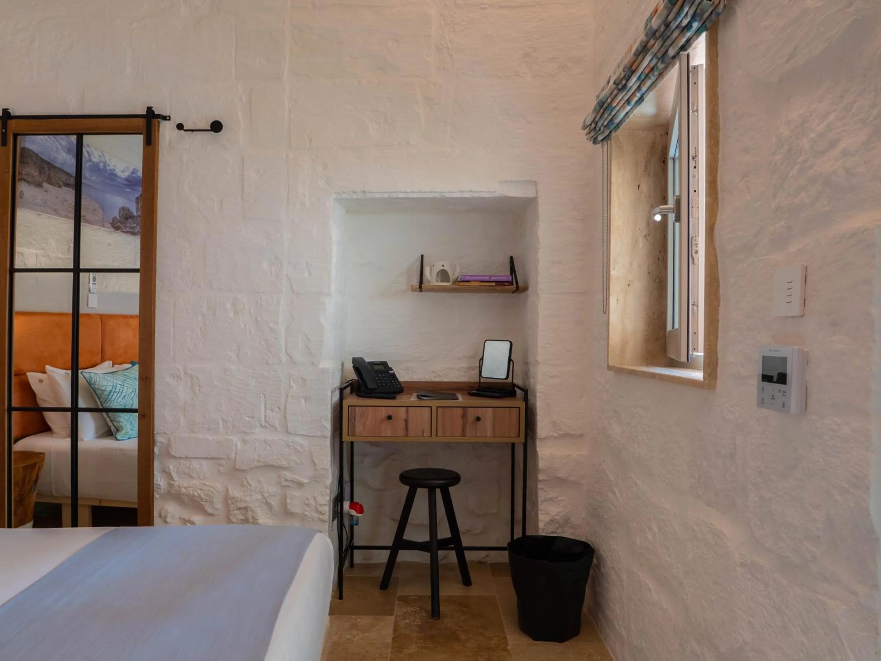 Photo of the whole room, Bed in The Mdina Heritage Boutique Hotel - By Luxury Villas International