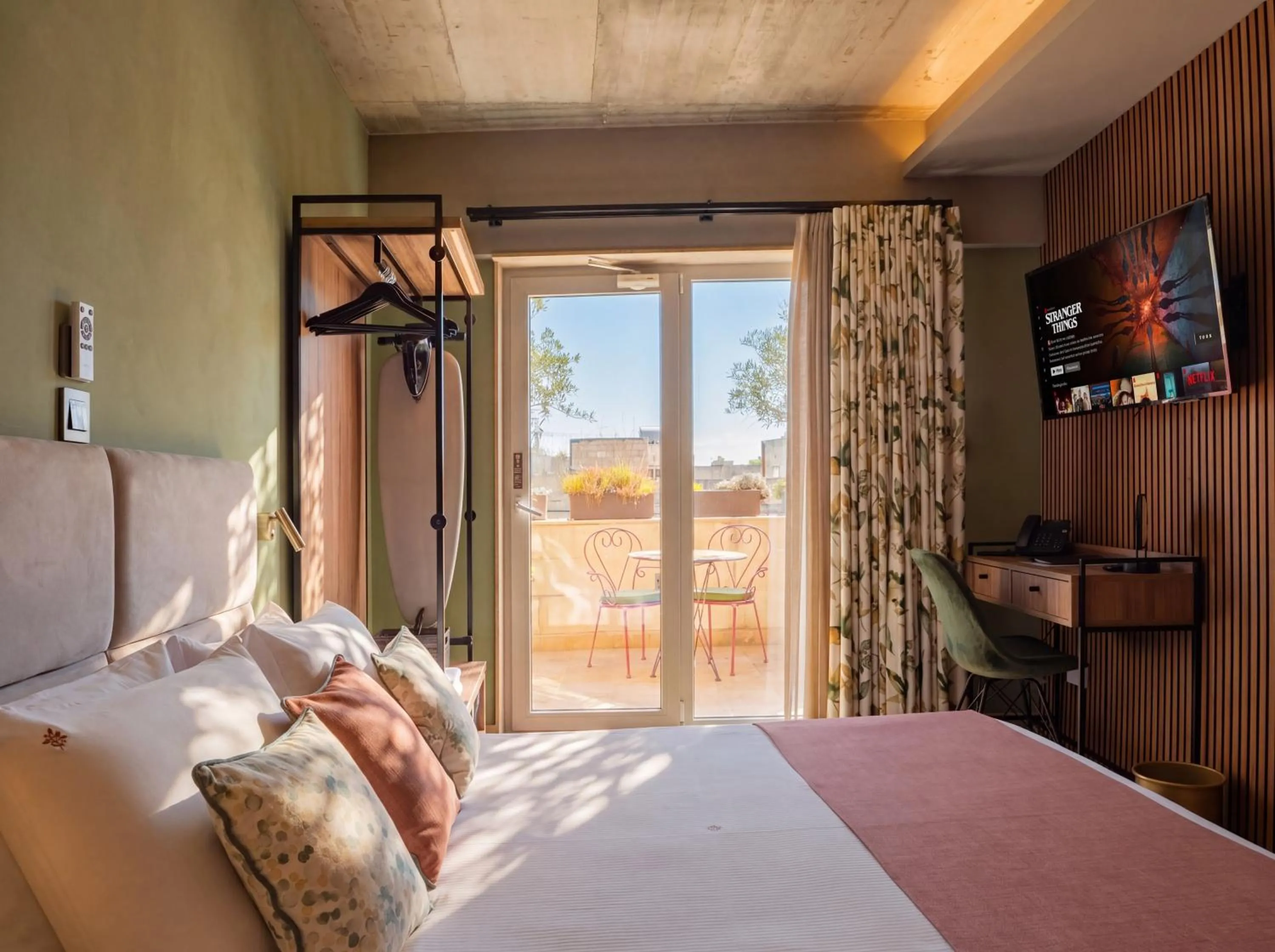 Communal lounge/ TV room, Bed in The Mdina Heritage Boutique Hotel - By Luxury Villas International