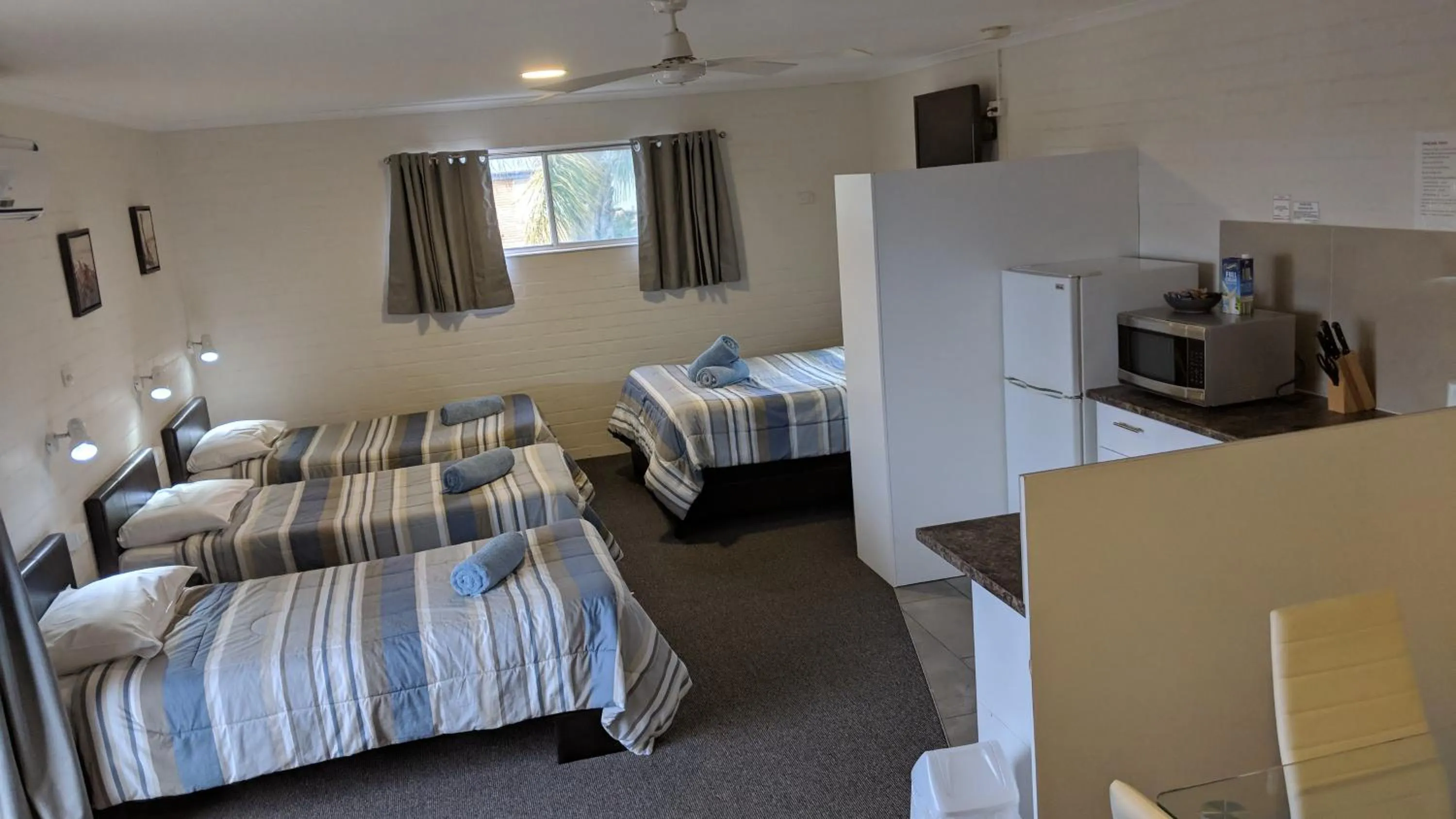 Bed in Harrington Village Motel