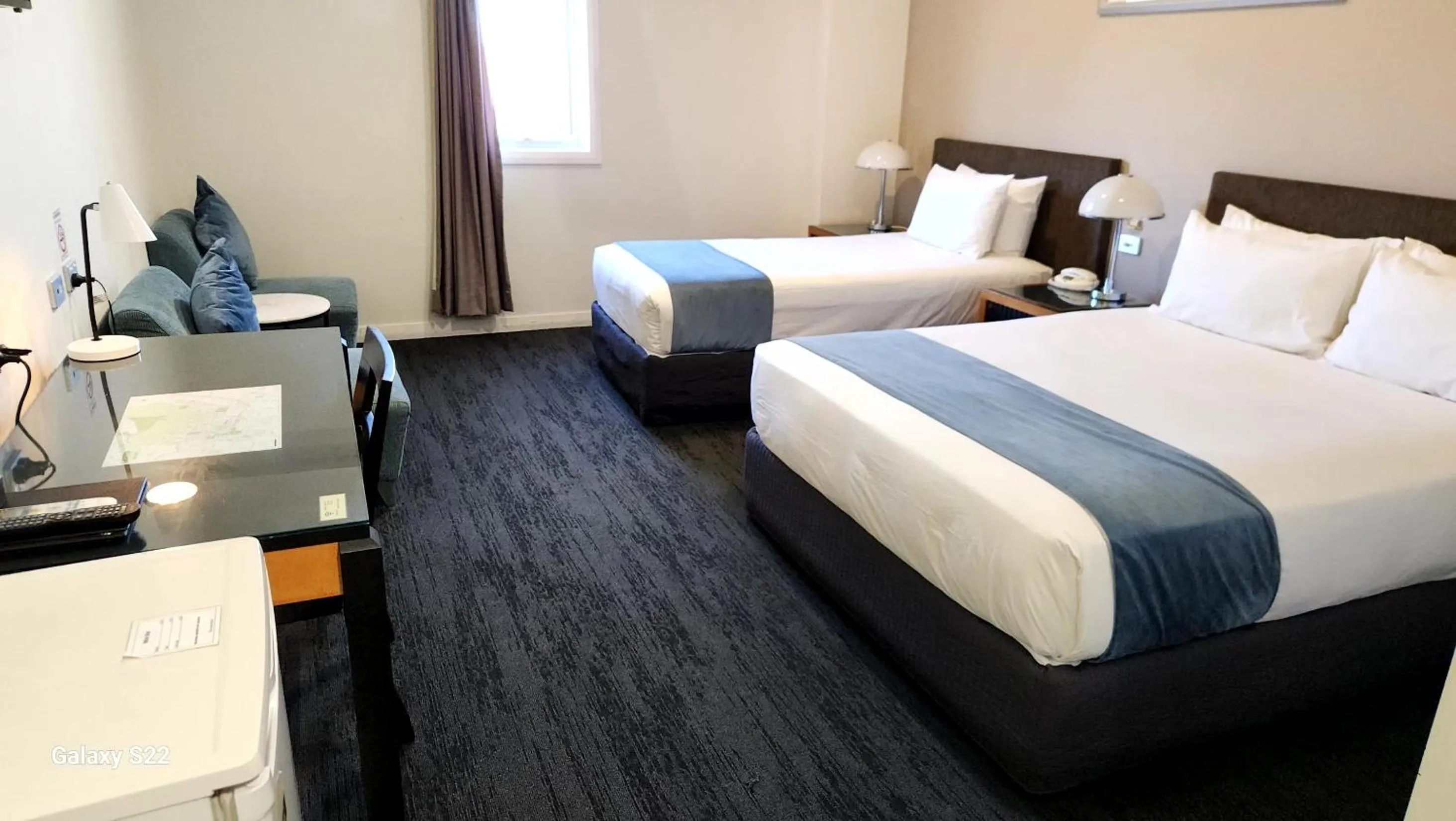 Bed in The Grand Motel