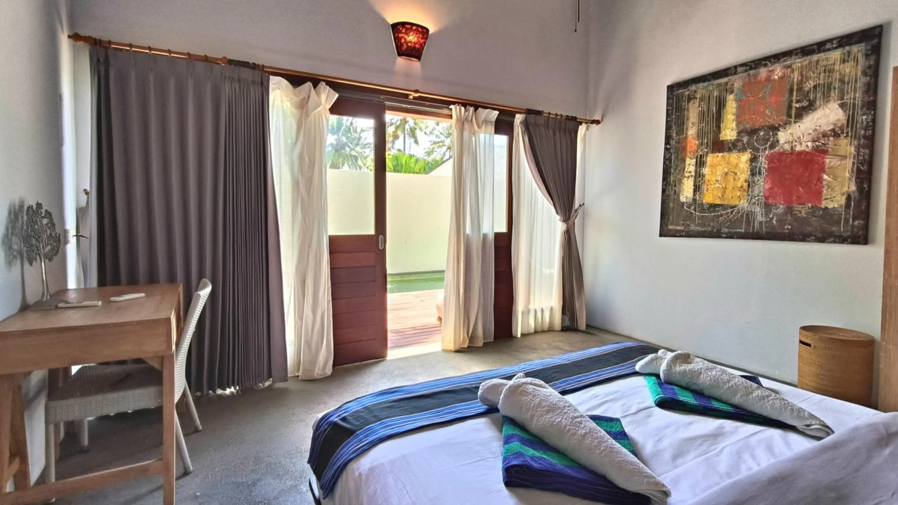 Bed in Kies Villas Lombok
