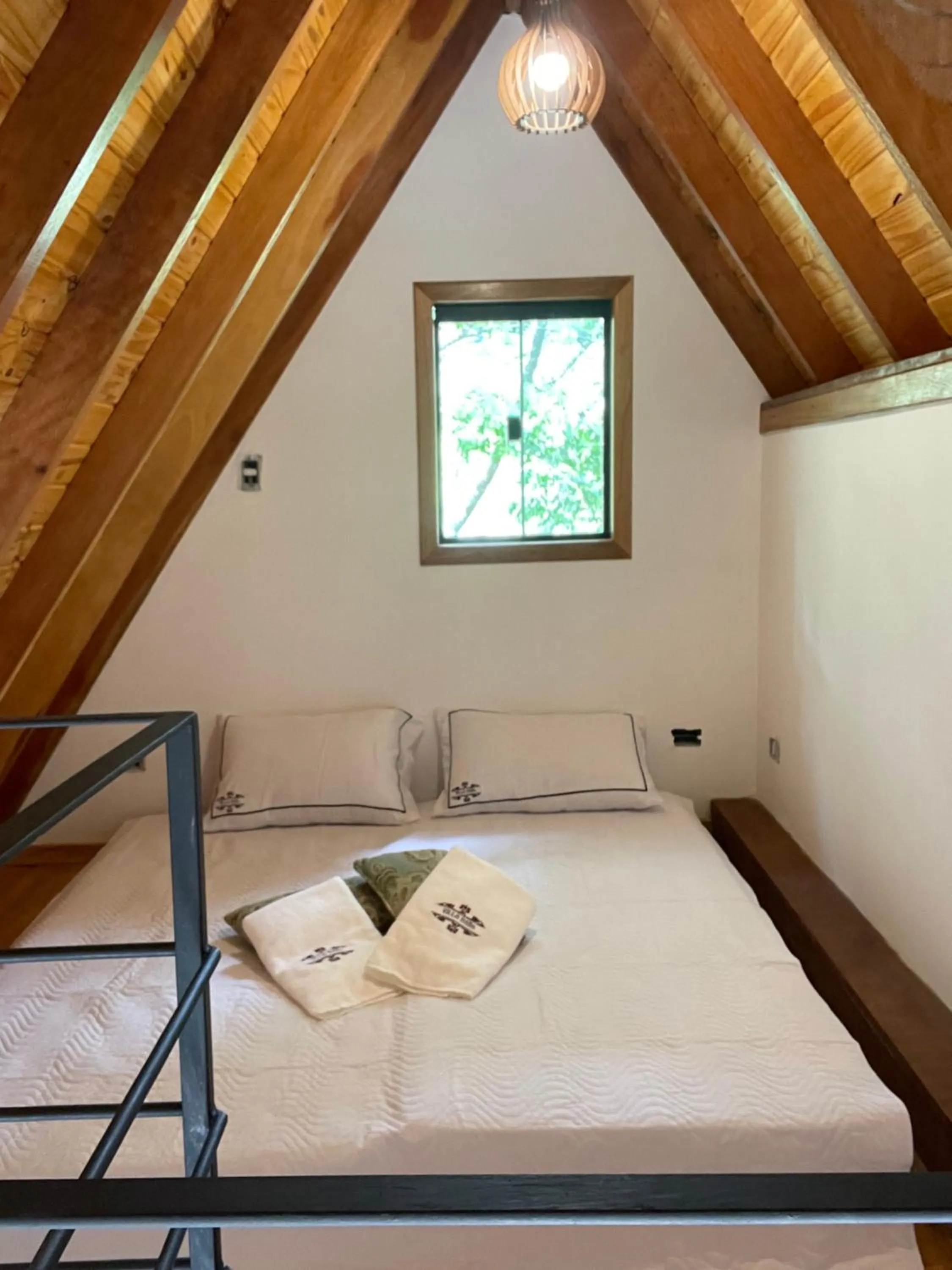 Bed in VILLA ITÁLIA CHALÉ