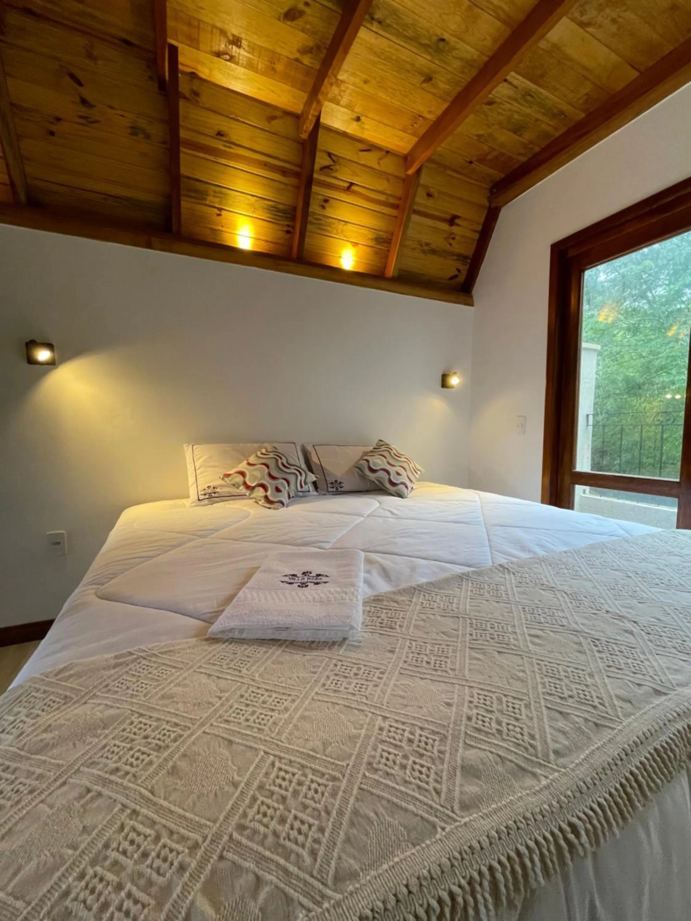 Bed in VILLA ITÁLIA CHALÉ