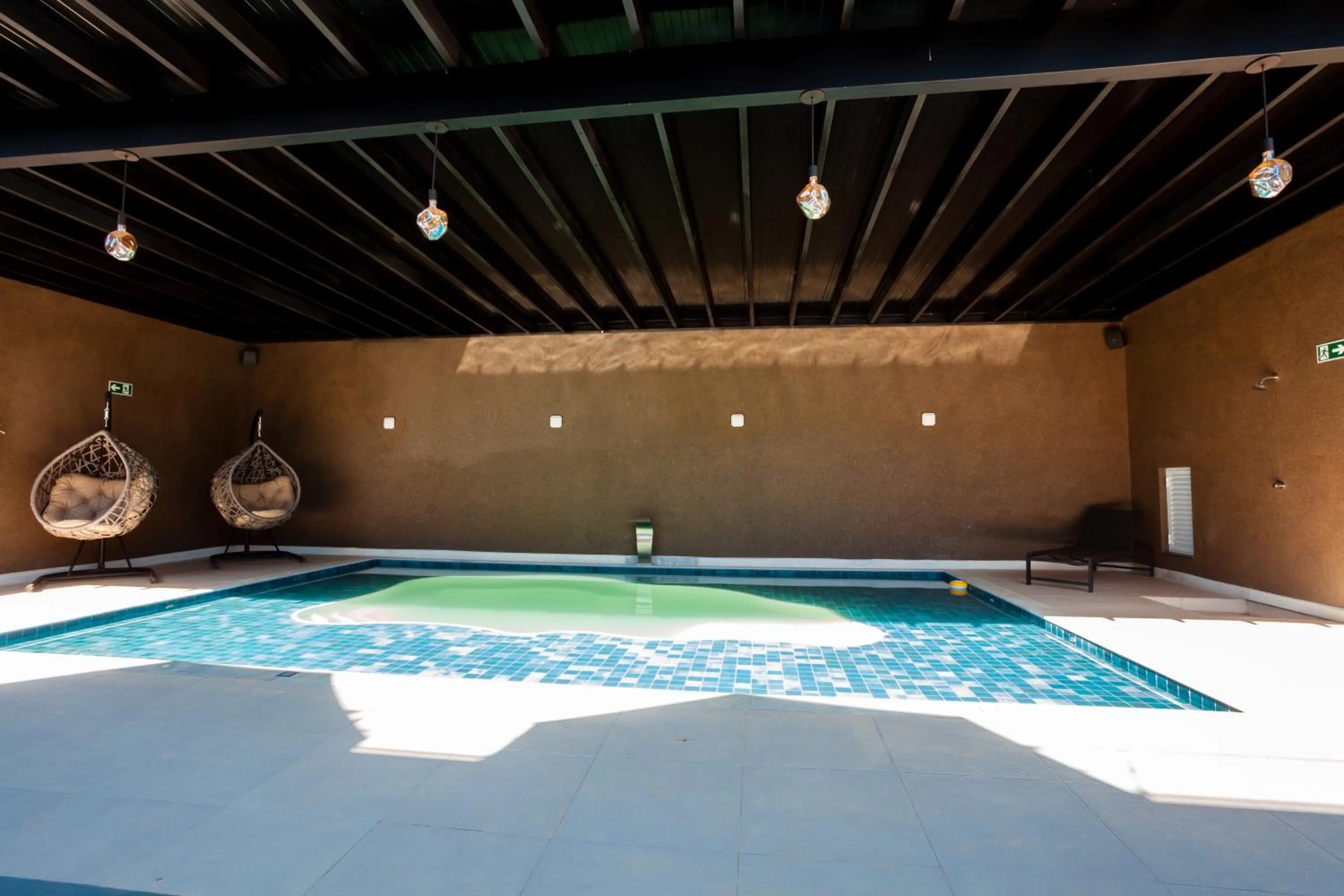 Swimming pool in Sophita Business Hotel