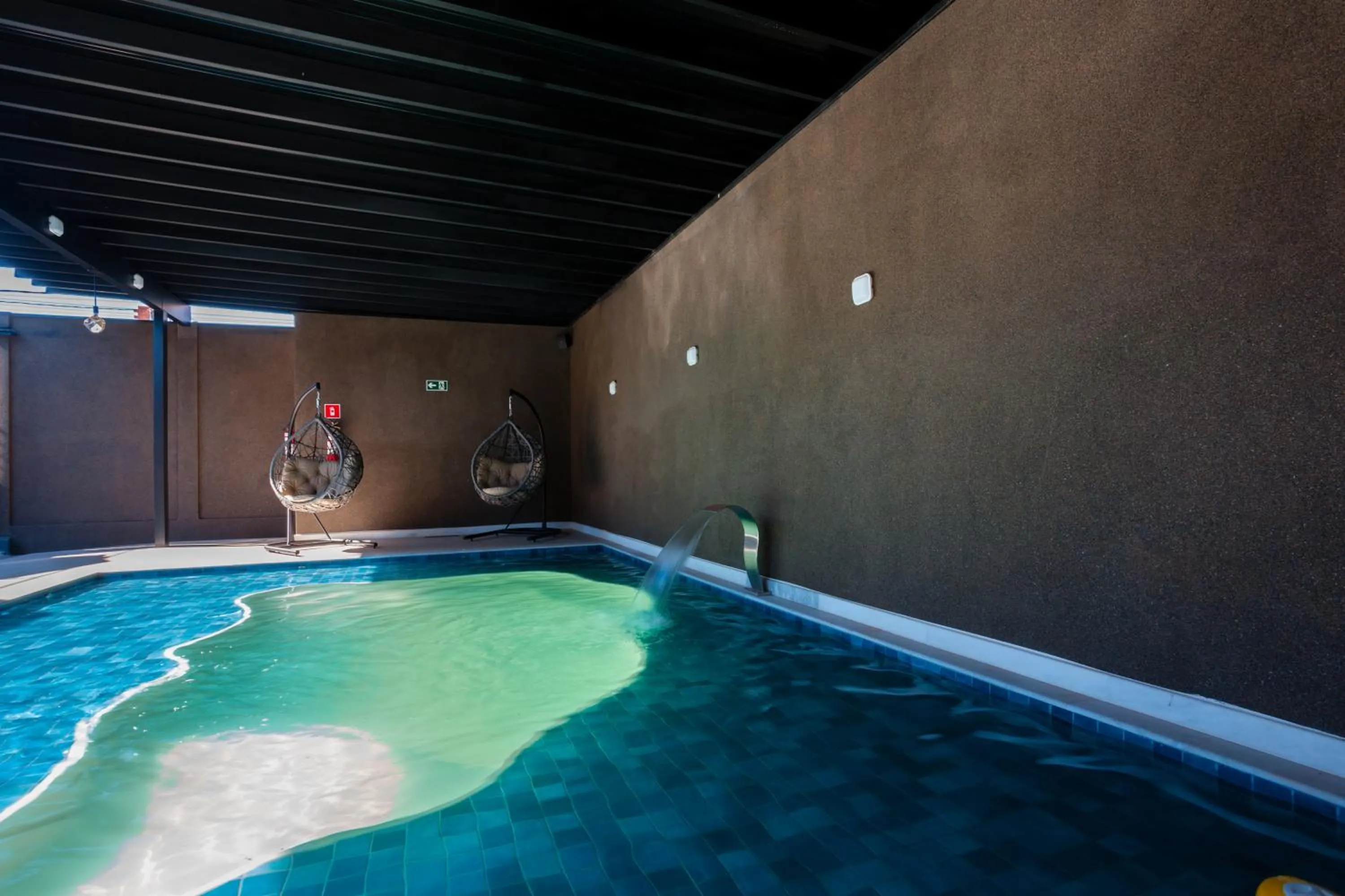 Swimming pool in Sophita Business Hotel