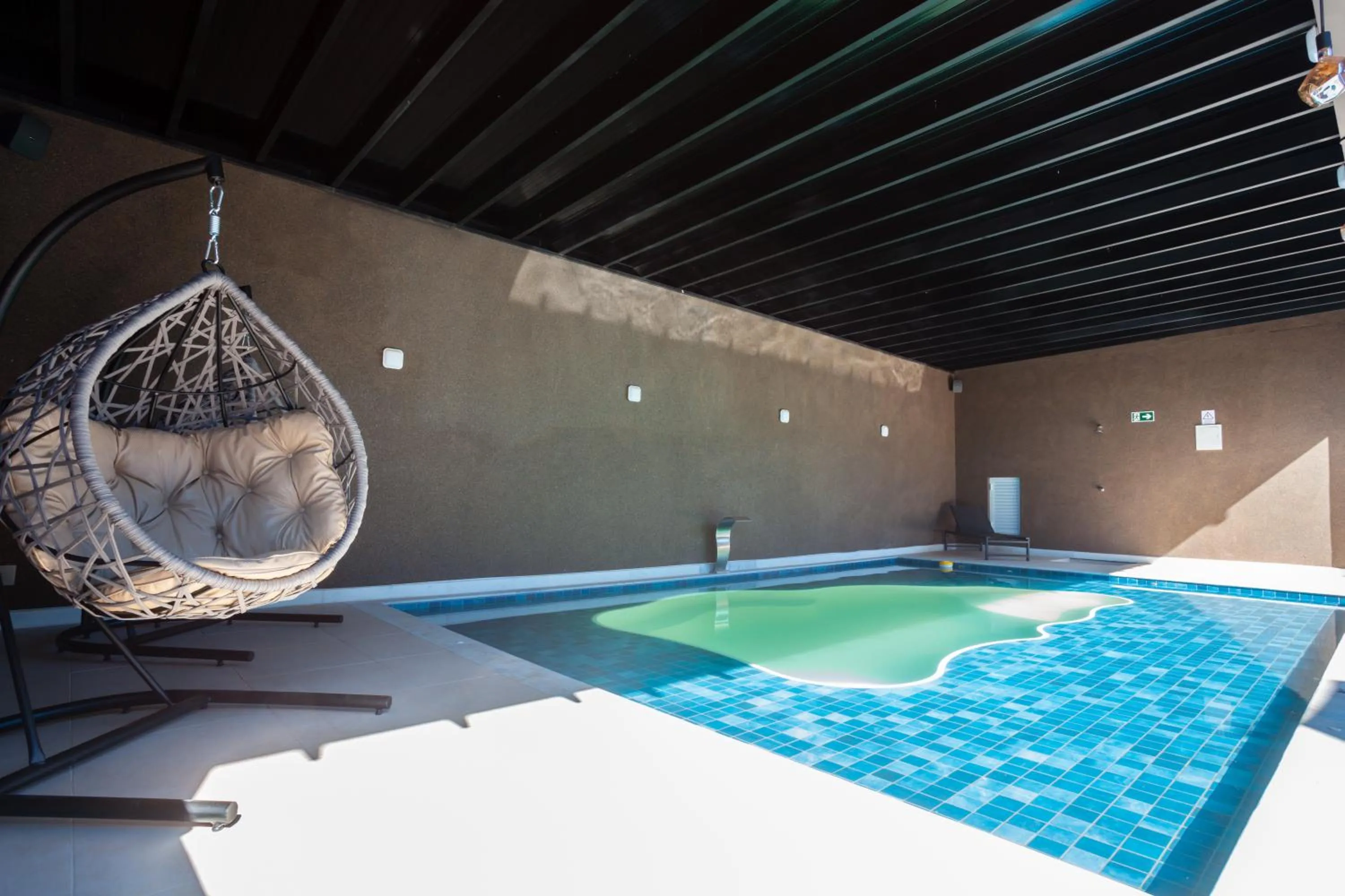Swimming pool in Sophita Business Hotel