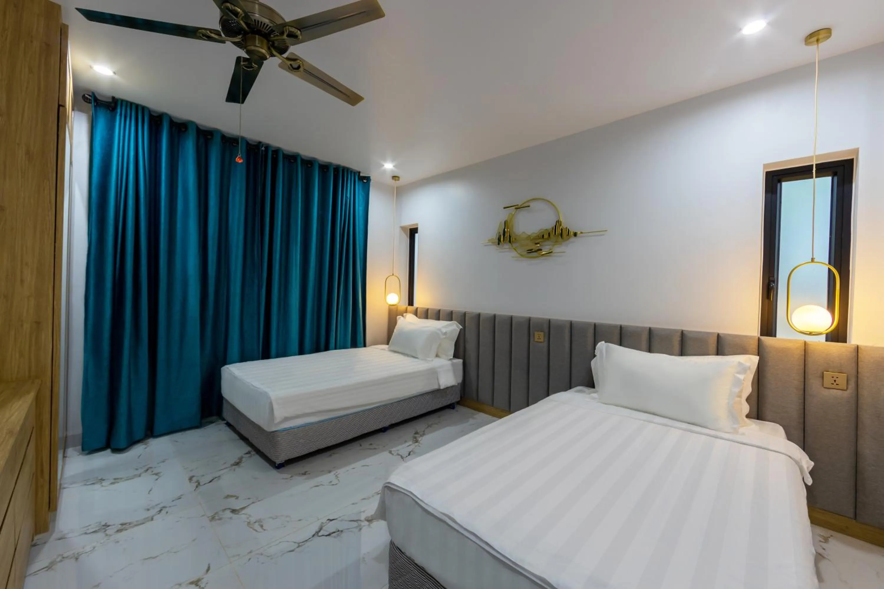 Bedroom in SS Villa & Resort