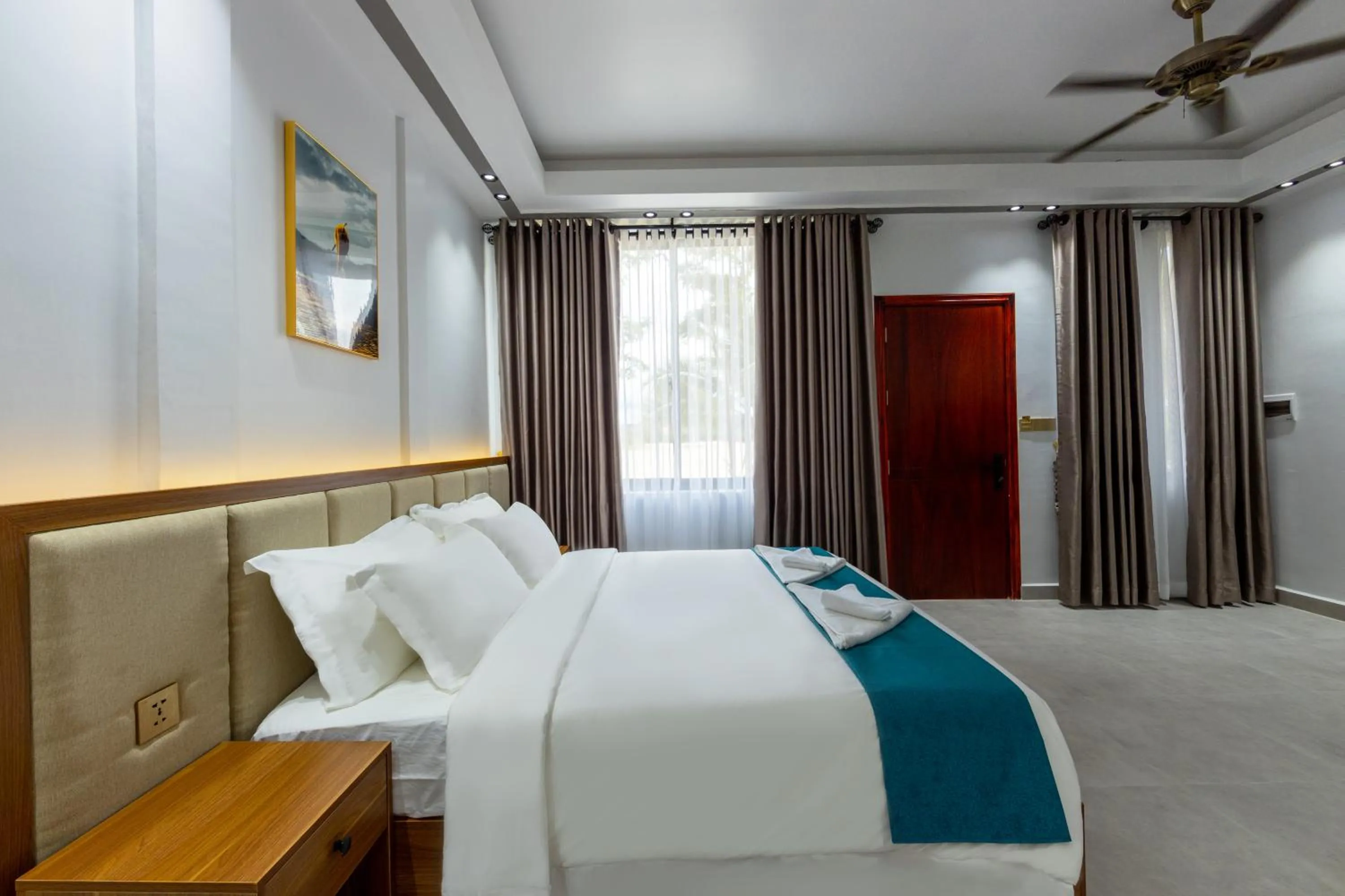 Bedroom in SS Villa & Resort