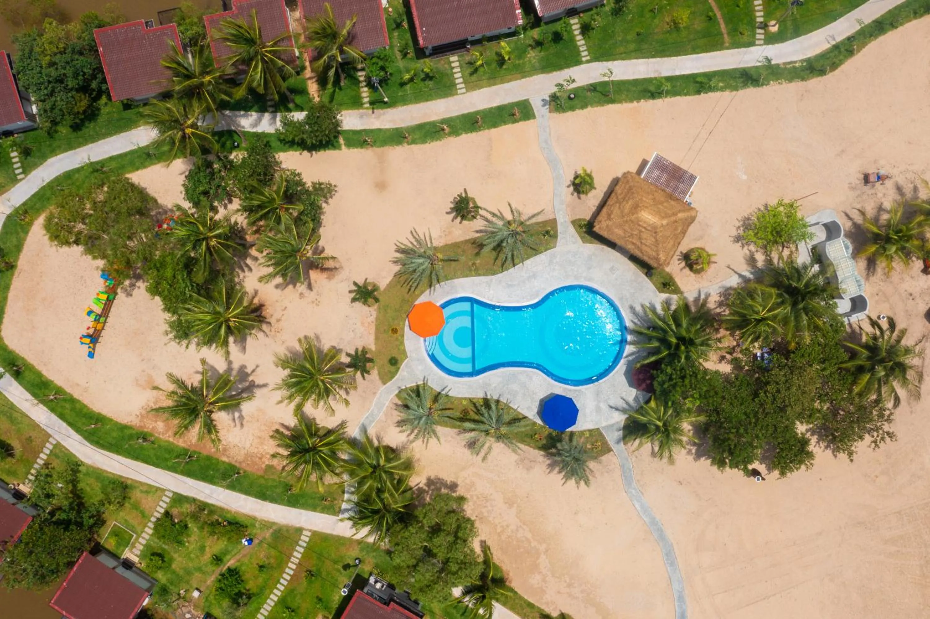 Swimming pool in SS Villa & Resort