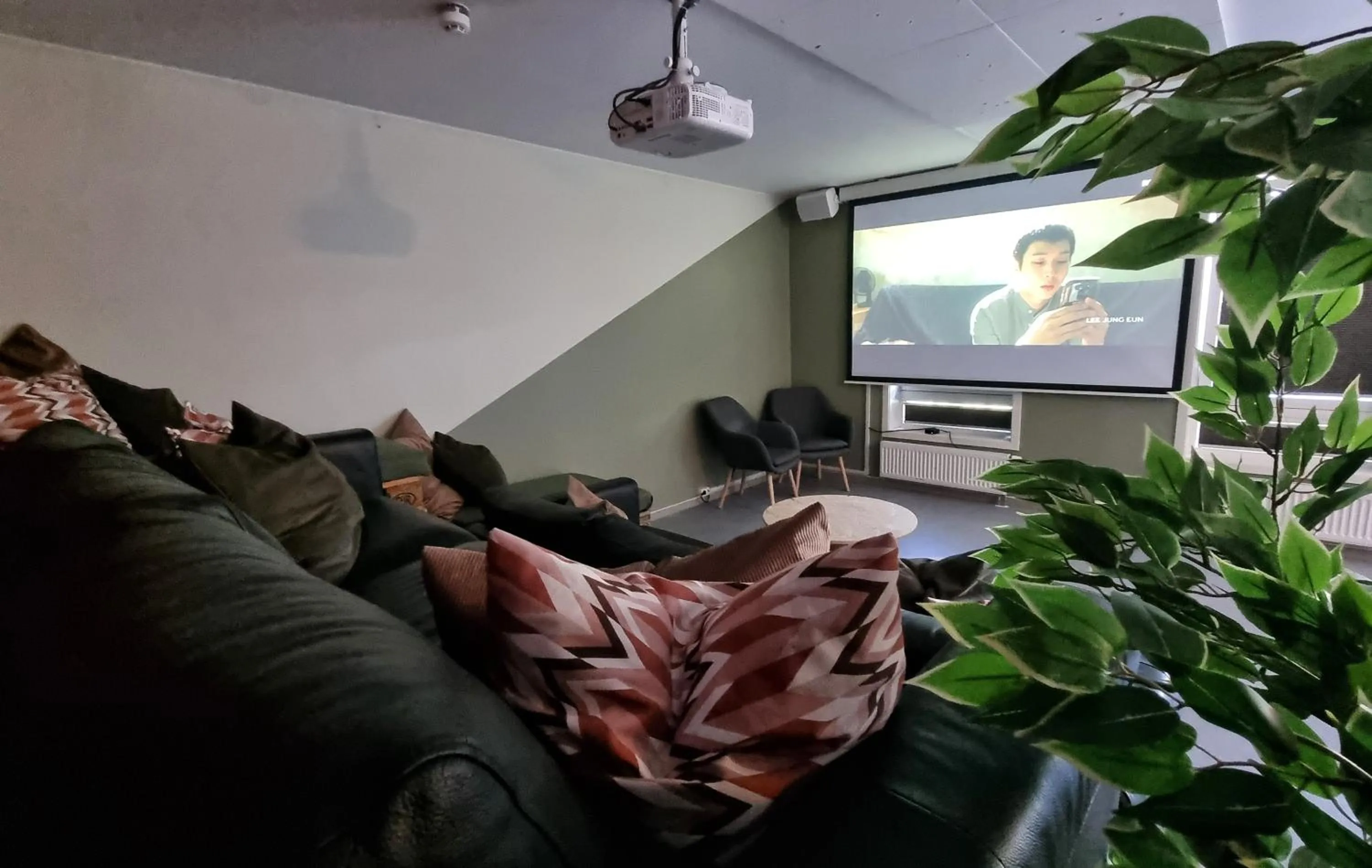 Communal lounge/ TV room in Rumi Hostel