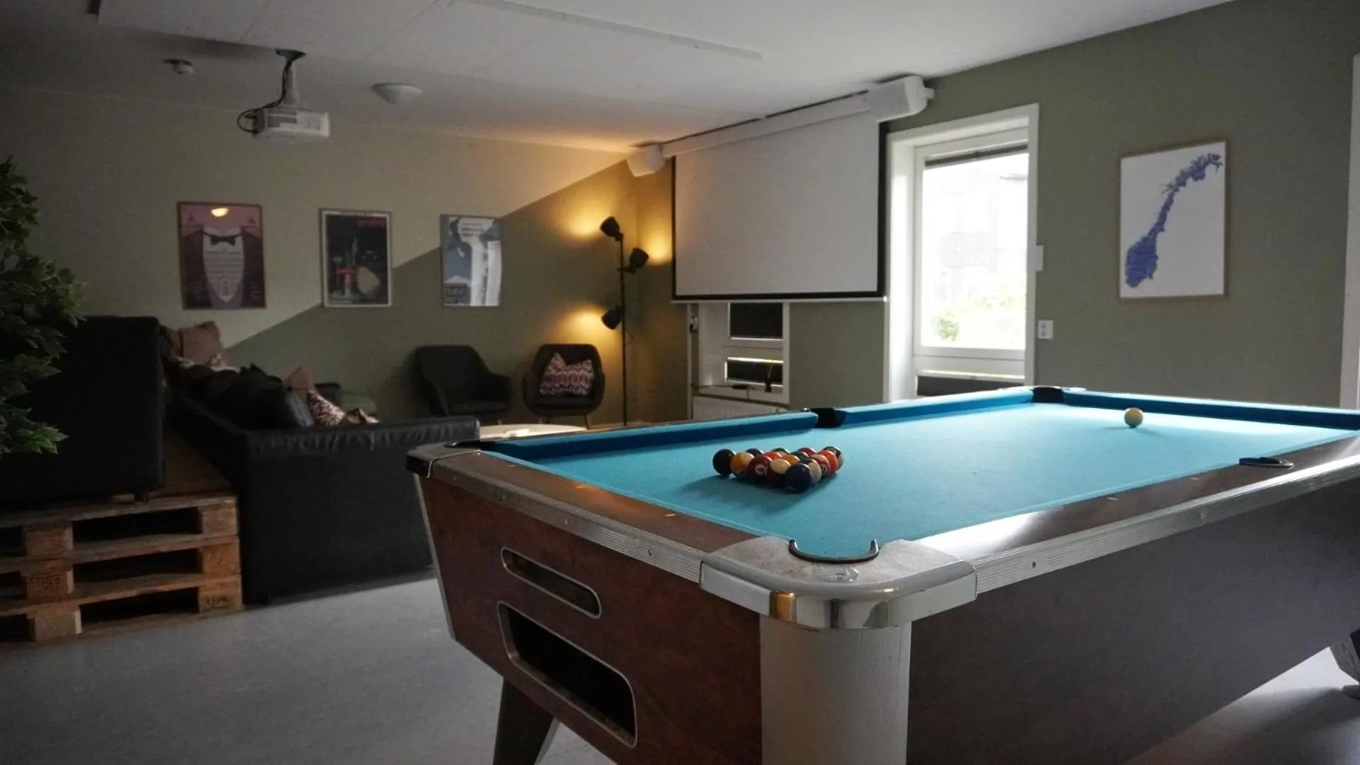 Communal lounge/ TV room in Rumi Hostel