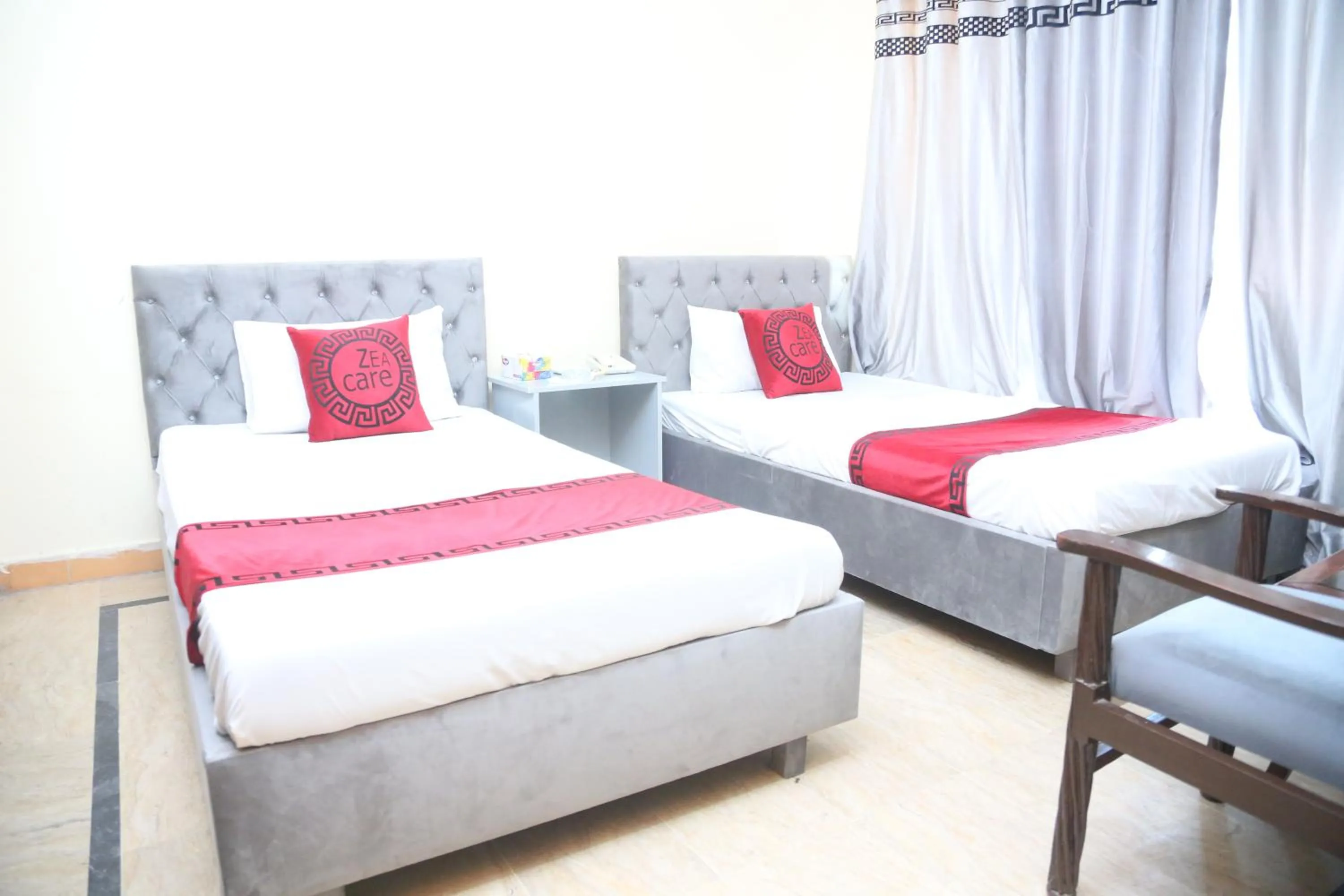 Photo of the whole room, Bed in Hotel Zea Care Johar Town Lahore