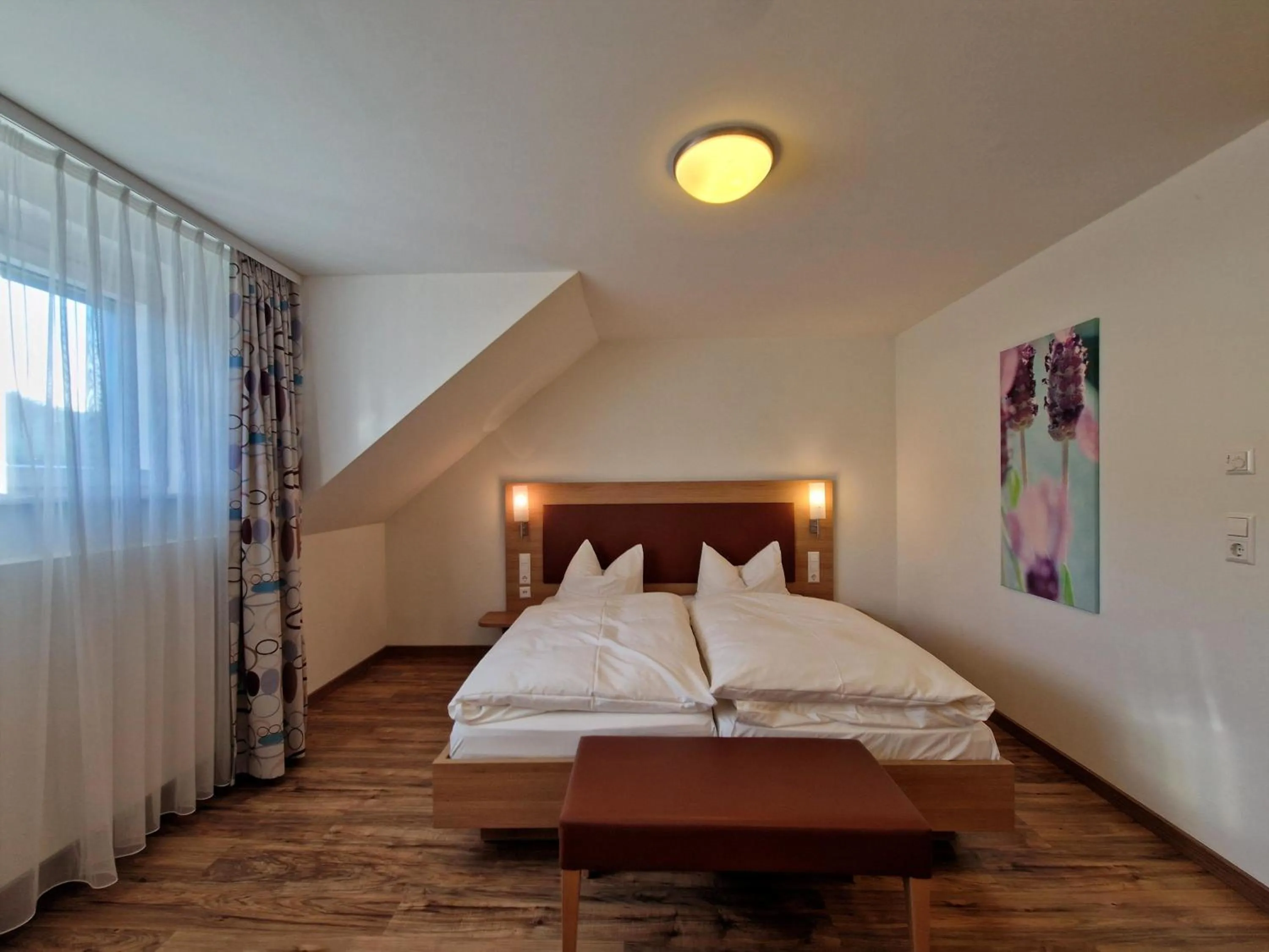 Bed in Blume Hausach I Hotel & Restaurant