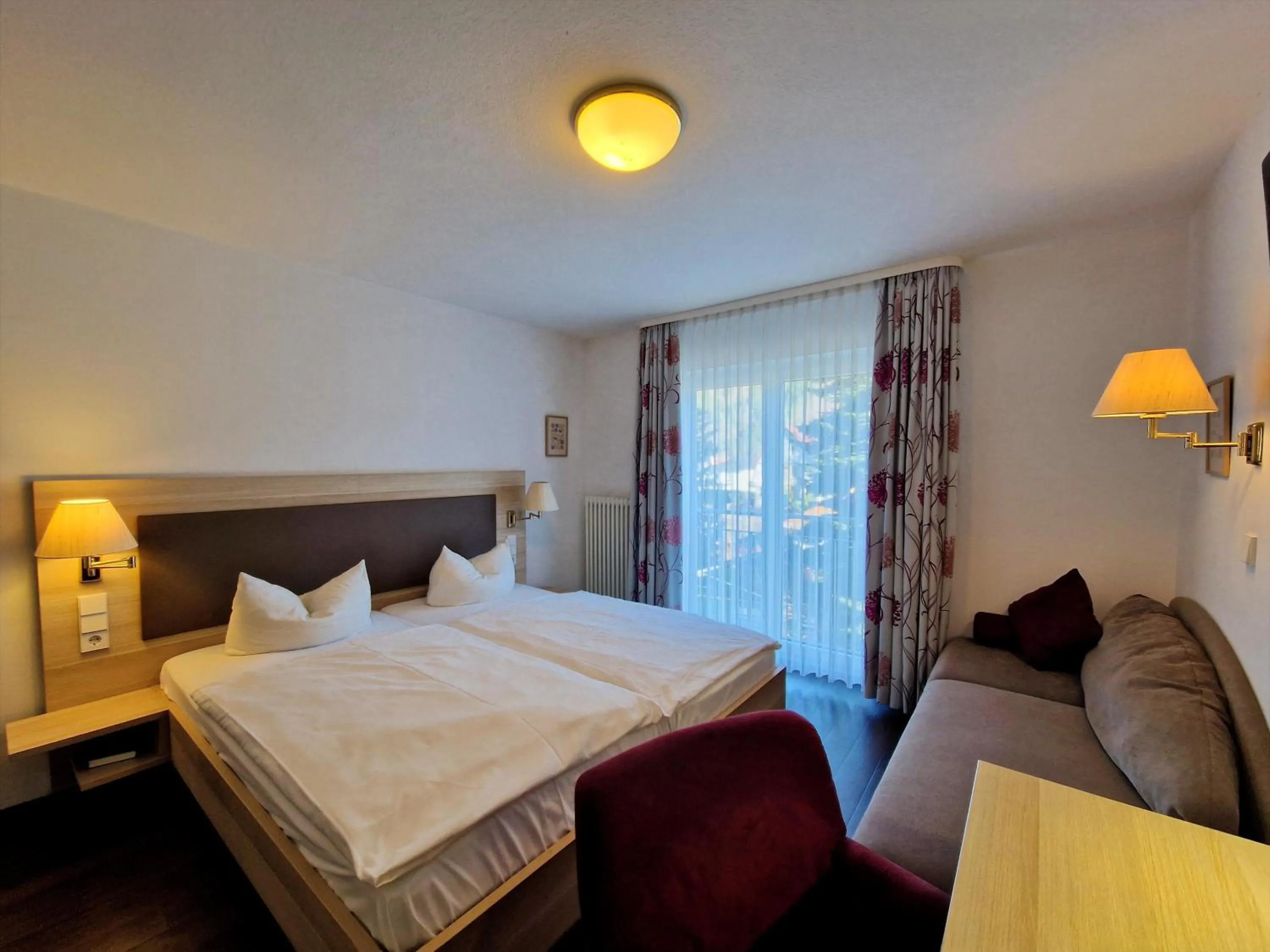 Bed in Blume Hausach I Hotel & Restaurant