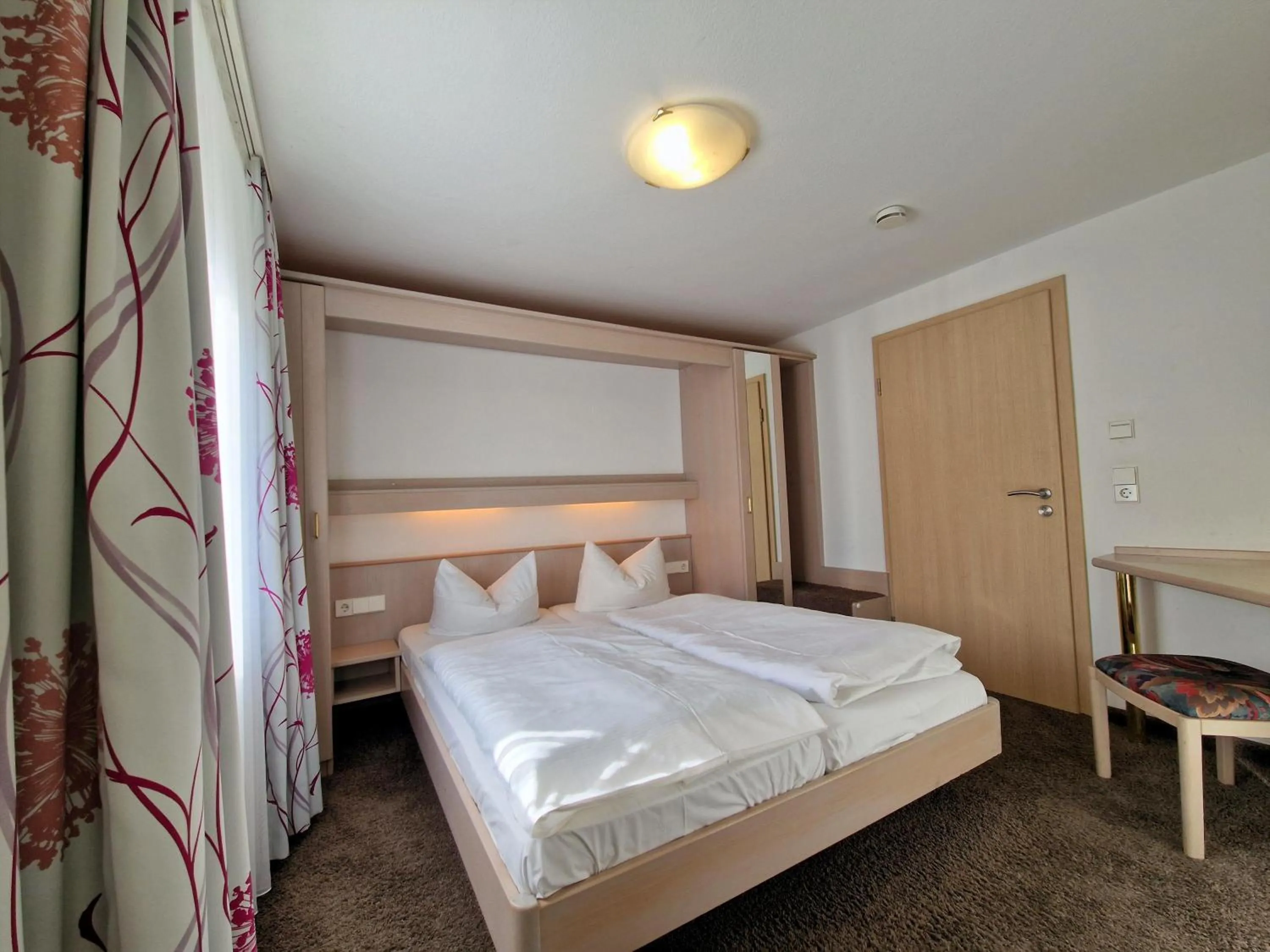 Bed in Blume Hausach I Hotel & Restaurant