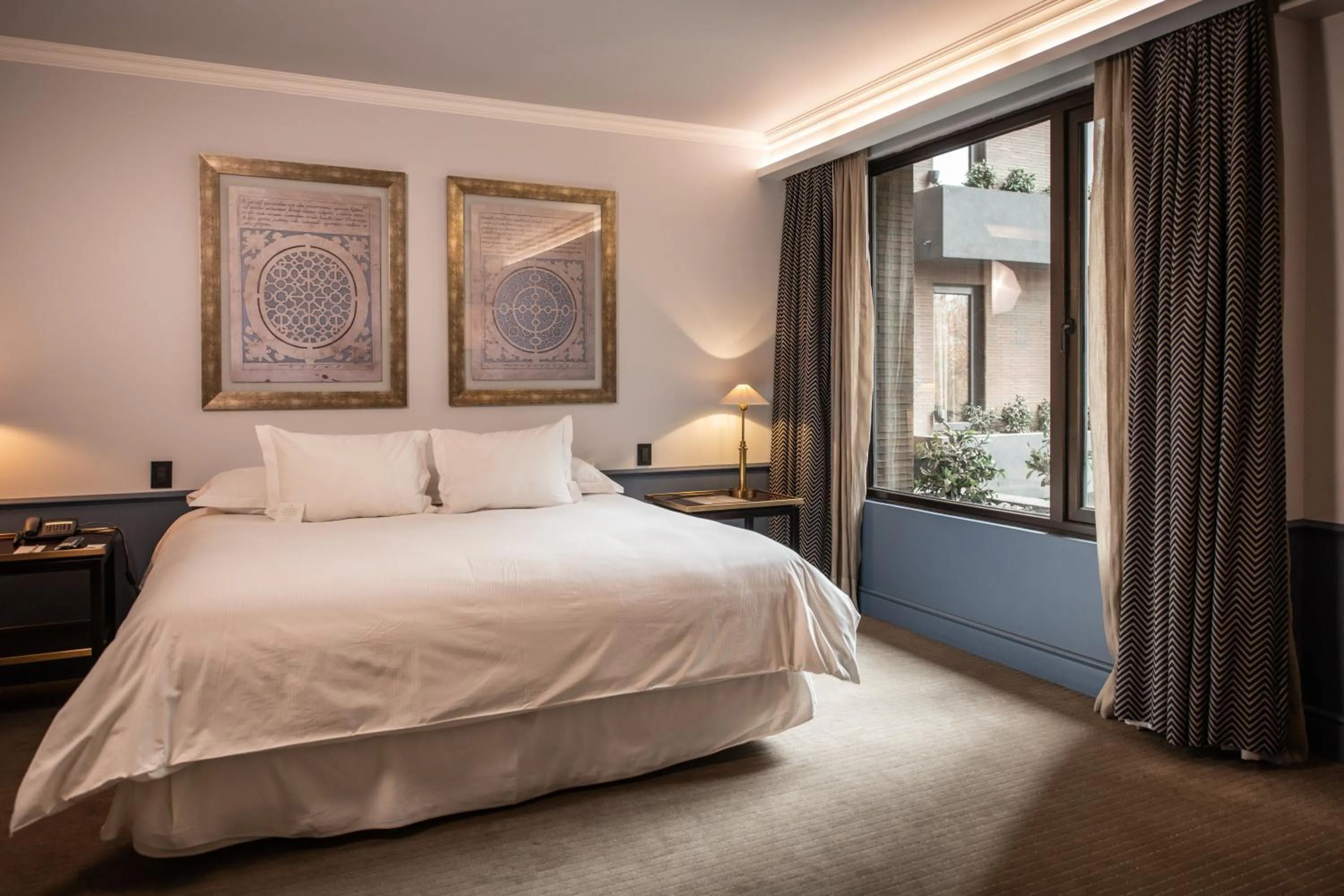 Photo of the whole room, Bed in The Singular Santiago