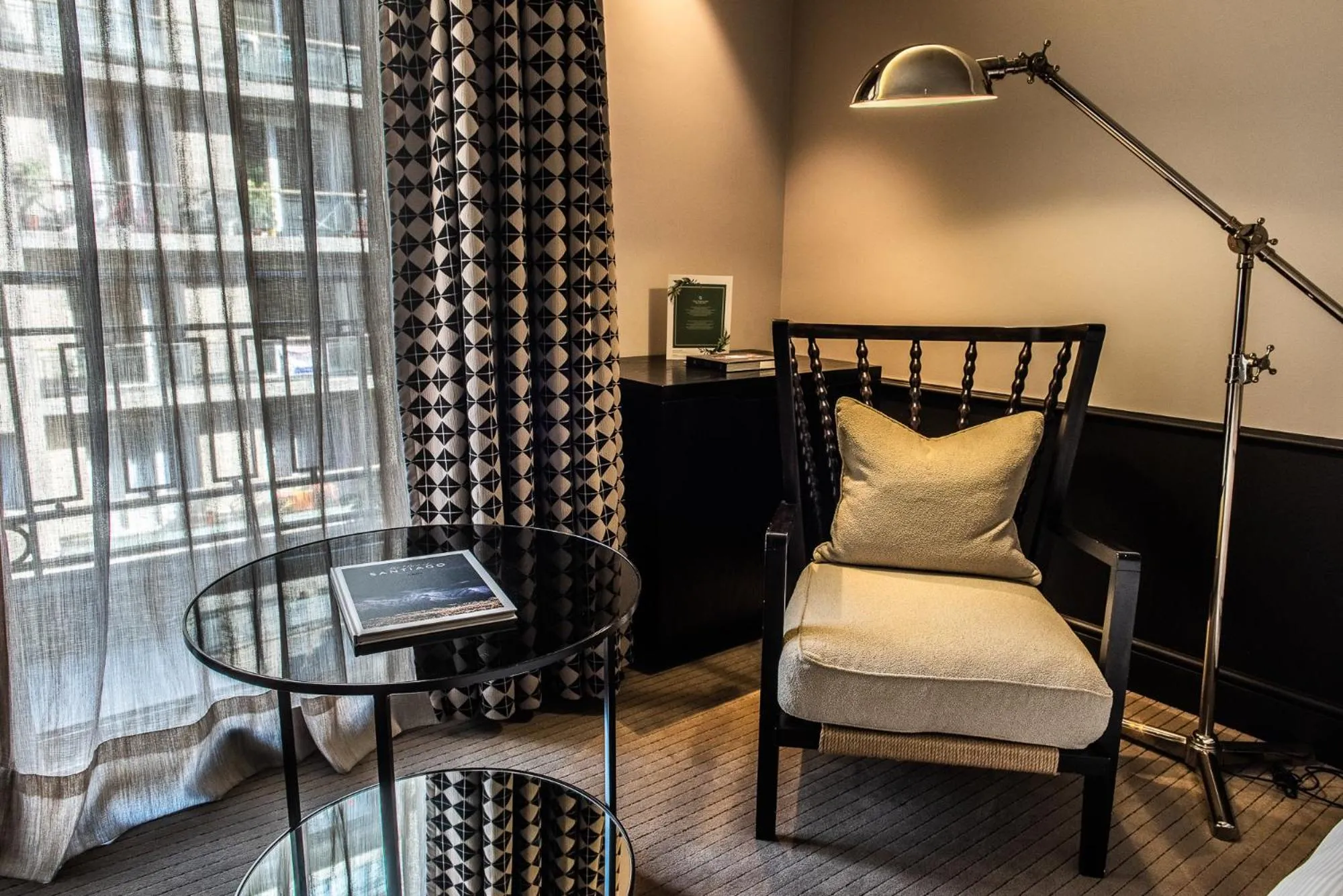 Seating area, Bed in The Singular Santiago