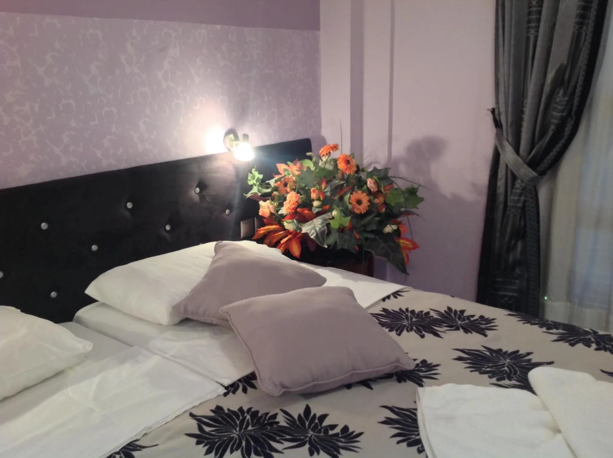 Bed in Asterias Studios & Apartments