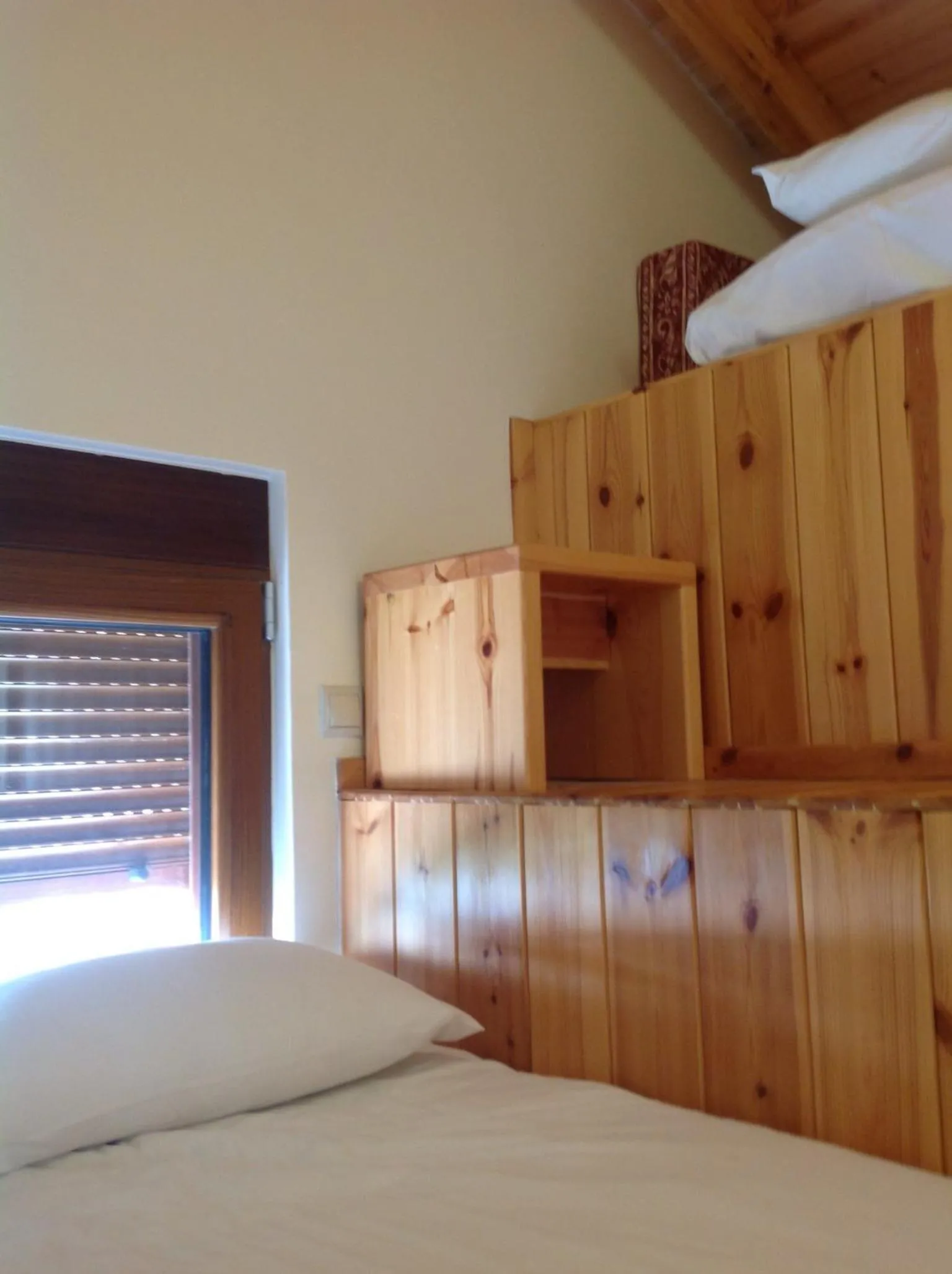 Bed in Asterias Studios & Apartments