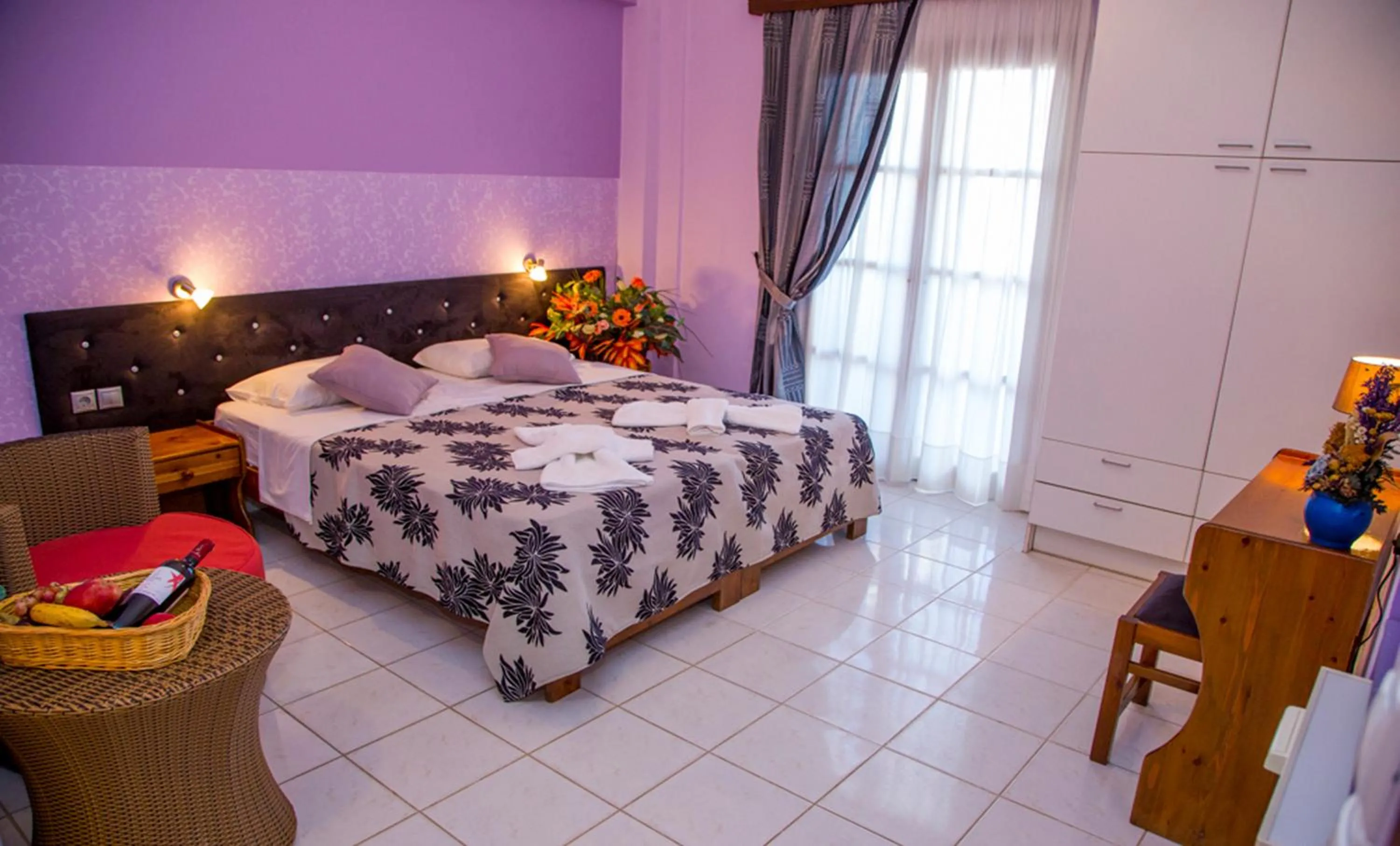 Bed in Asterias Studios & Apartments