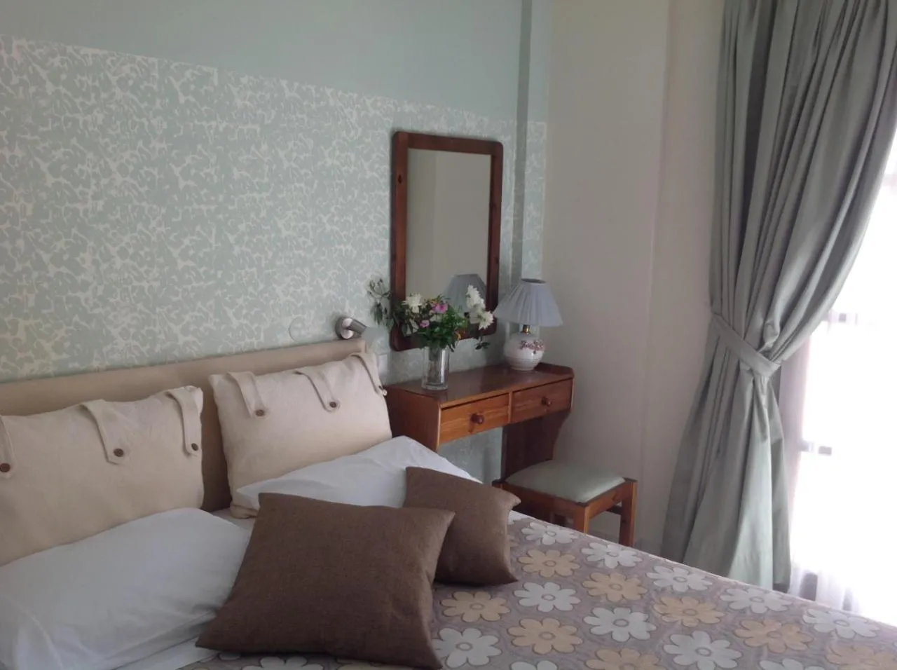 Bed in Asterias Studios & Apartments