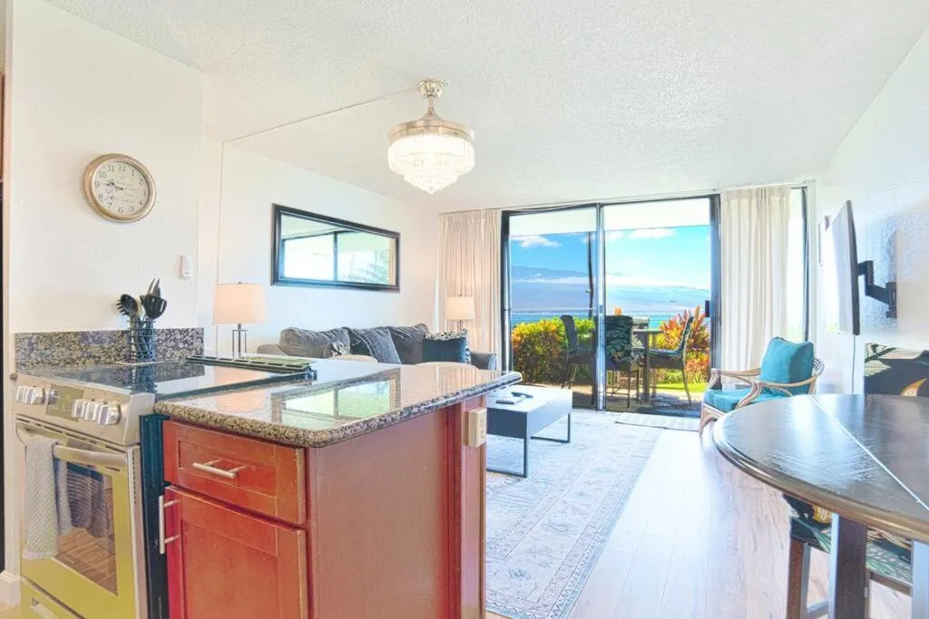 Kitchen or kitchenette in Stunning Maui Direct Ocean front on the beach, Walk to beach from Condo, Watch Turtles, Whales, AC in all rooms ocean view Pool and Spa