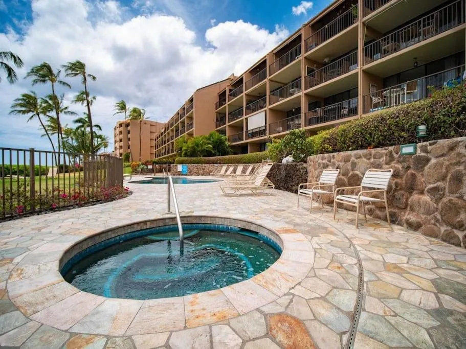 Hot Tub in Stunning Maui Direct Ocean front on the beach, Walk to beach from Condo, Watch Turtles, Whales, AC in all rooms ocean view Pool and Spa