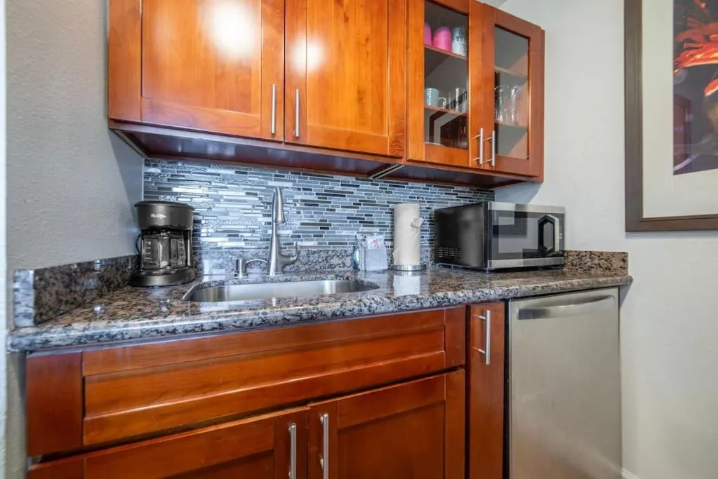Kitchen or kitchenette in Stunning Maui Direct Ocean front on the beach, Walk to beach from Condo, Watch Turtles, Whales, AC in all rooms ocean view Pool and Spa
