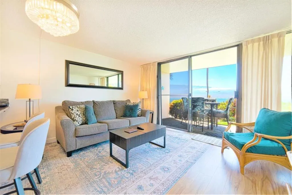 Living room in Stunning Maui Direct Ocean front on the beach, Walk to beach from Condo, Watch Turtles, Whales, AC in all rooms ocean view Pool and Spa