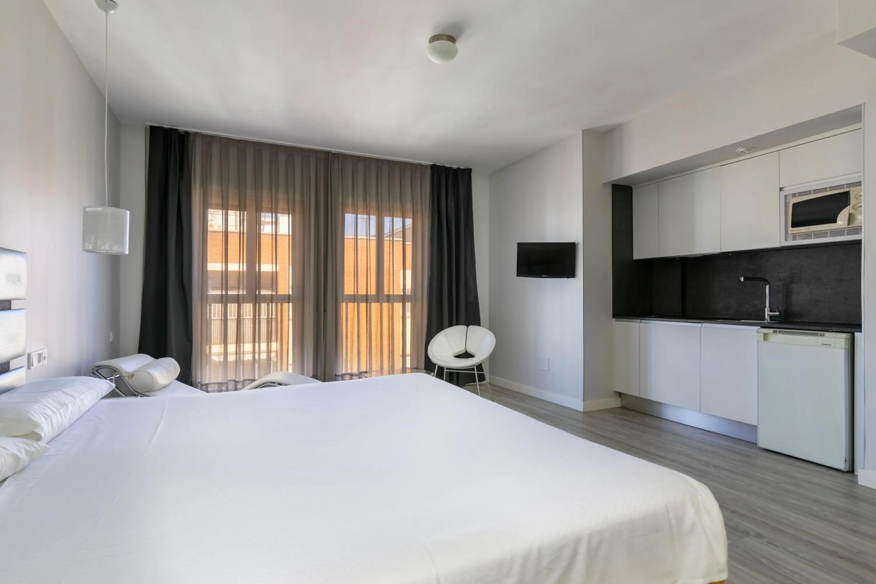 Bed in H-A Aparthotel Hotel Quo