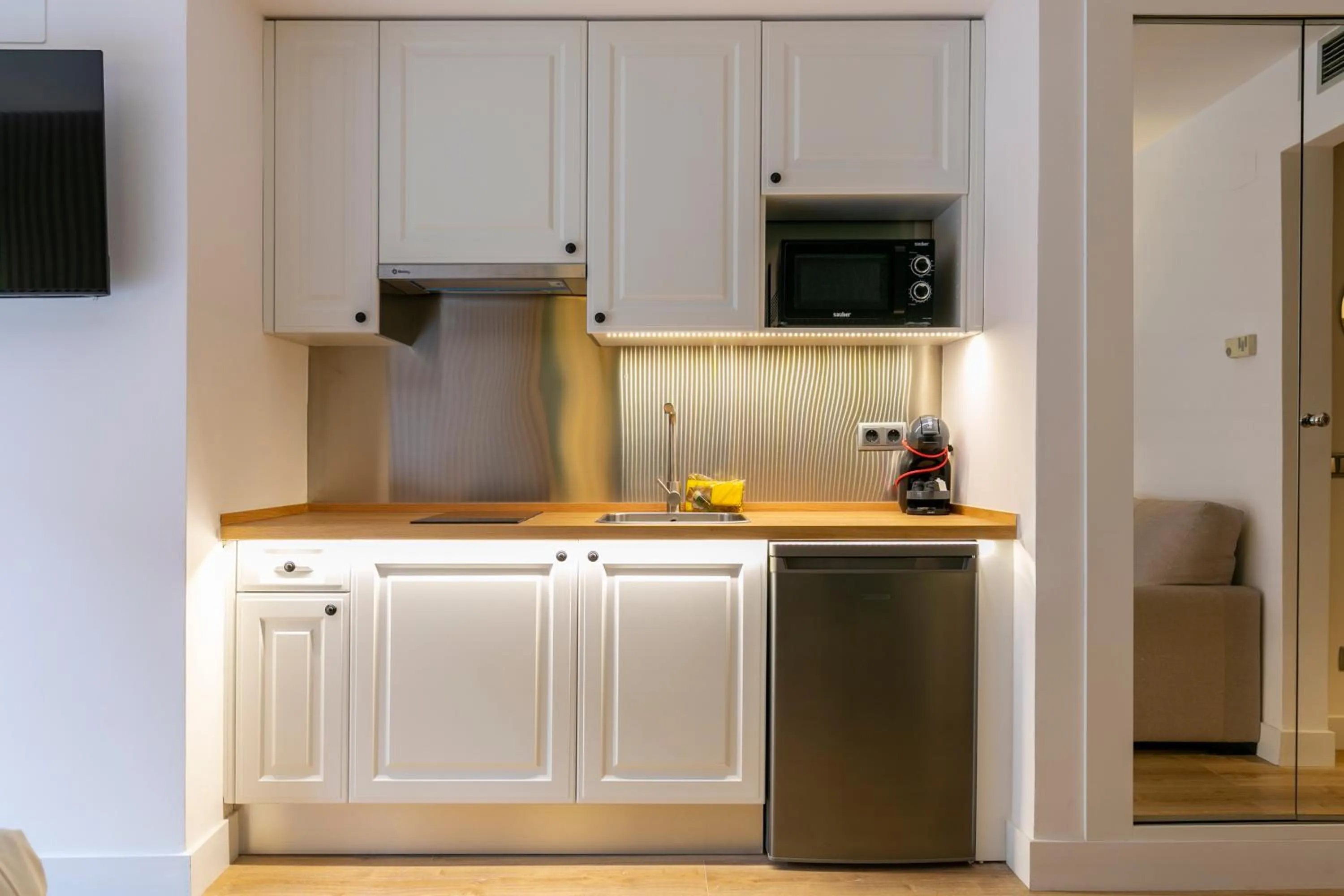 Kitchen or kitchenette in H-A Aparthotel Hotel Quo