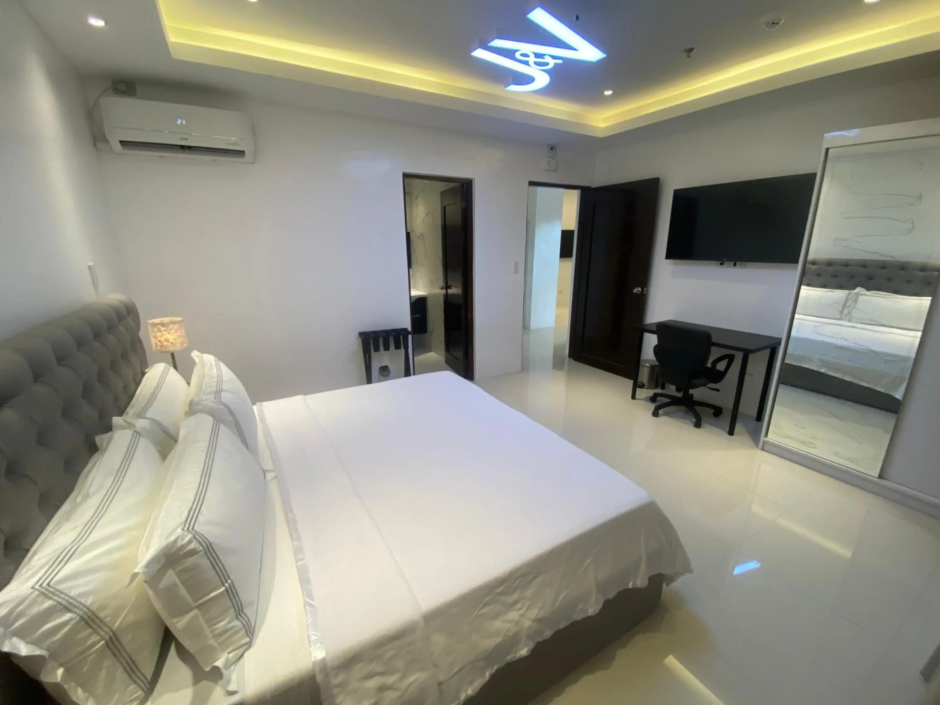 Bed in J&V Hotel and Resort