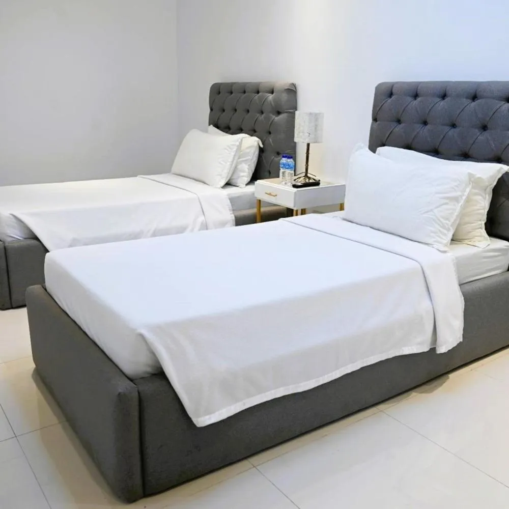 Bed in J&V Hotel and Resort