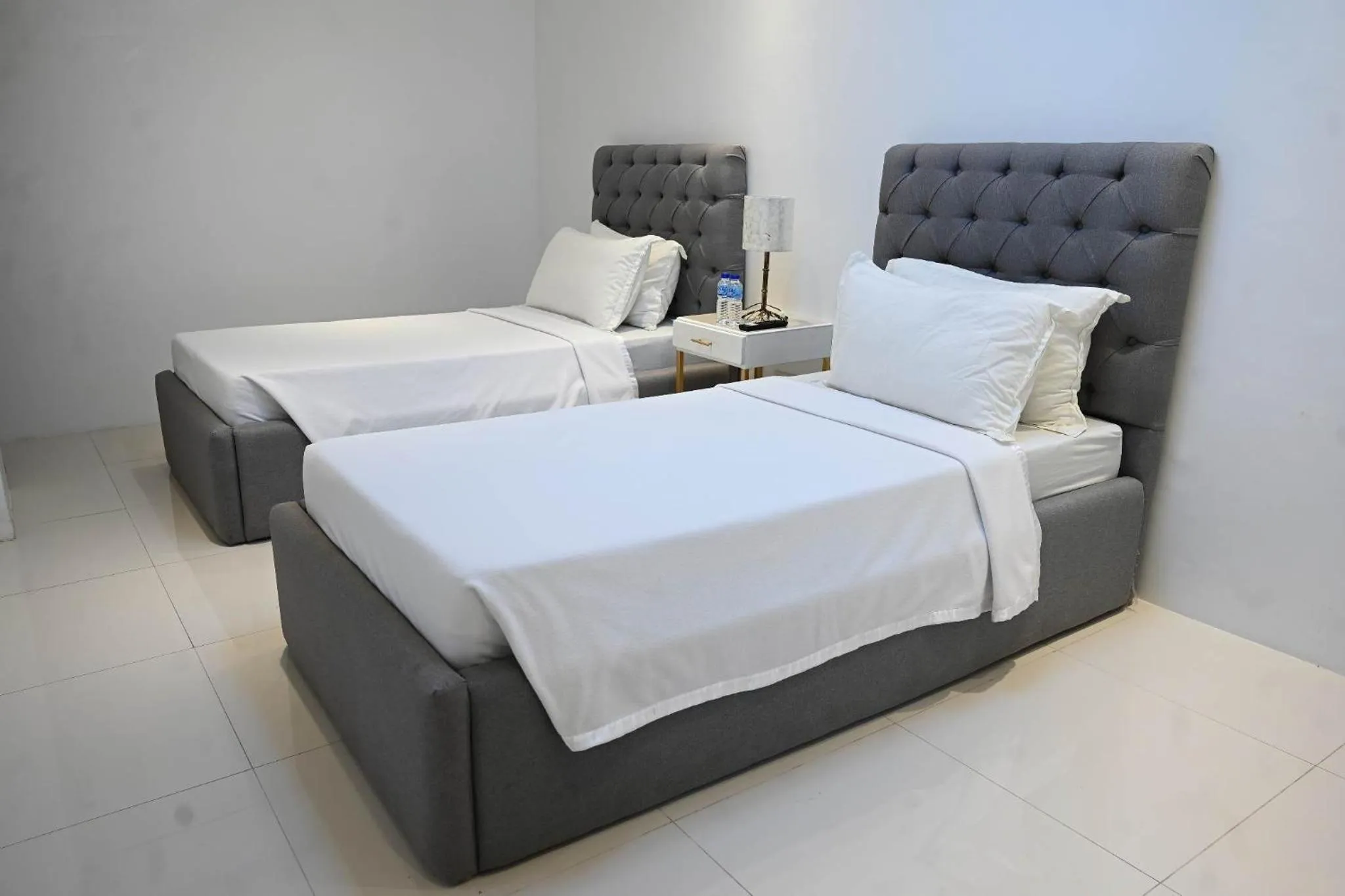 Bed in J&V Hotel and Resort