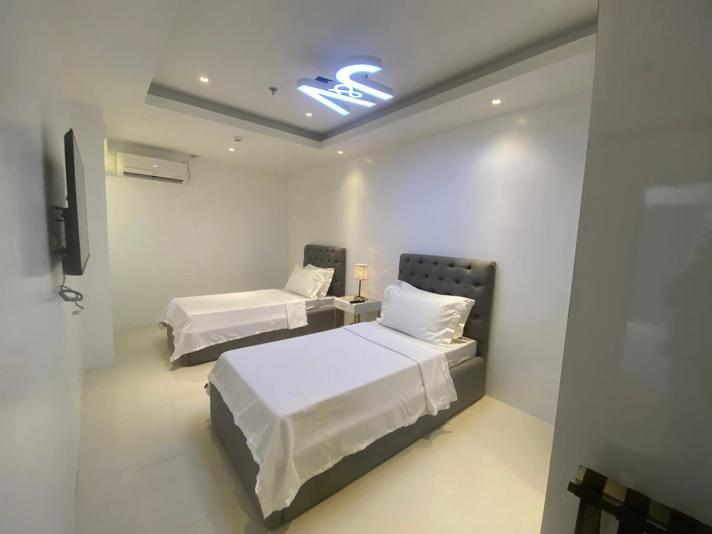 Bed in J&V Hotel and Resort