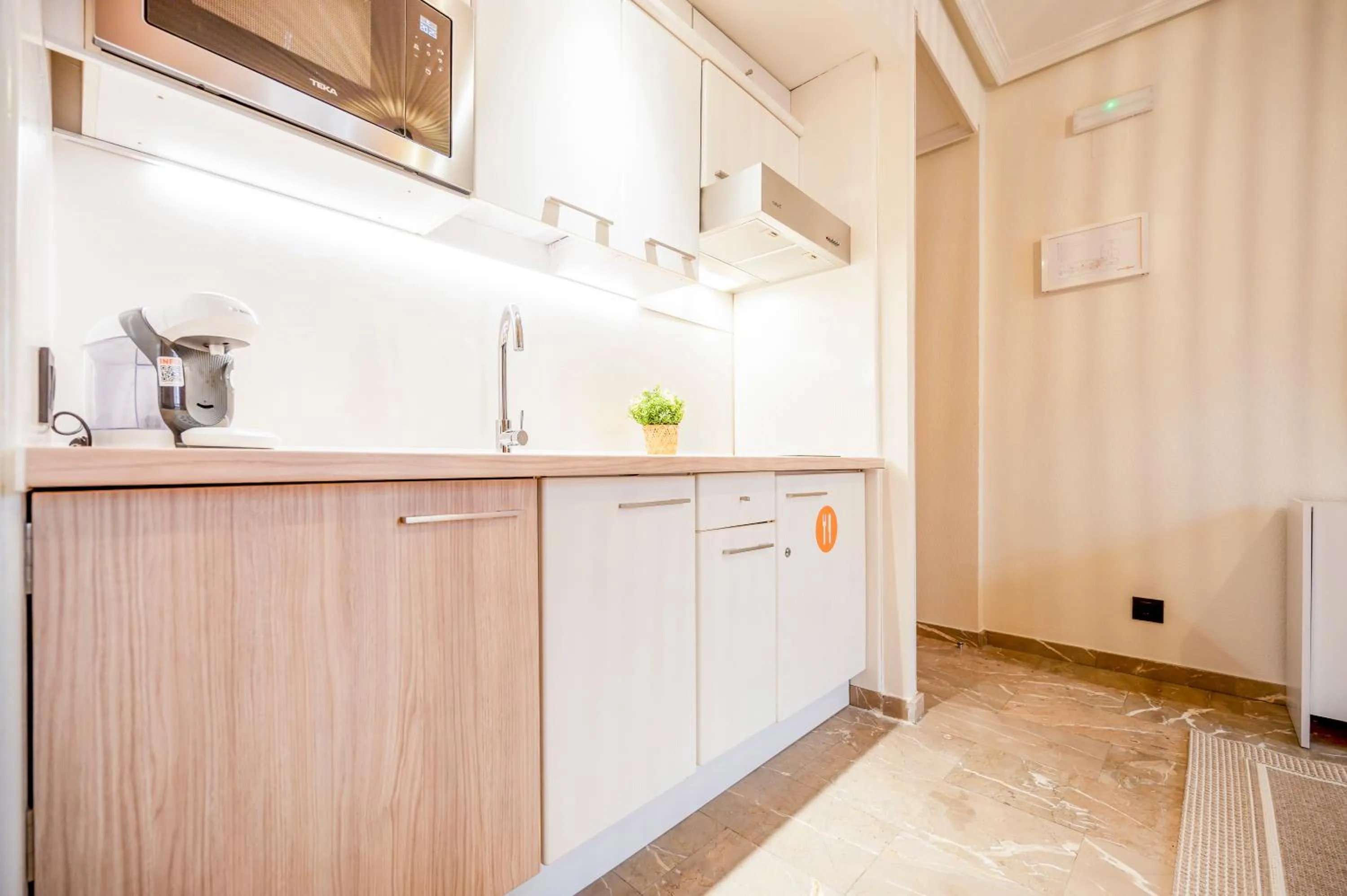 Kitchen or kitchenette in Apartamentos G3 Galeon