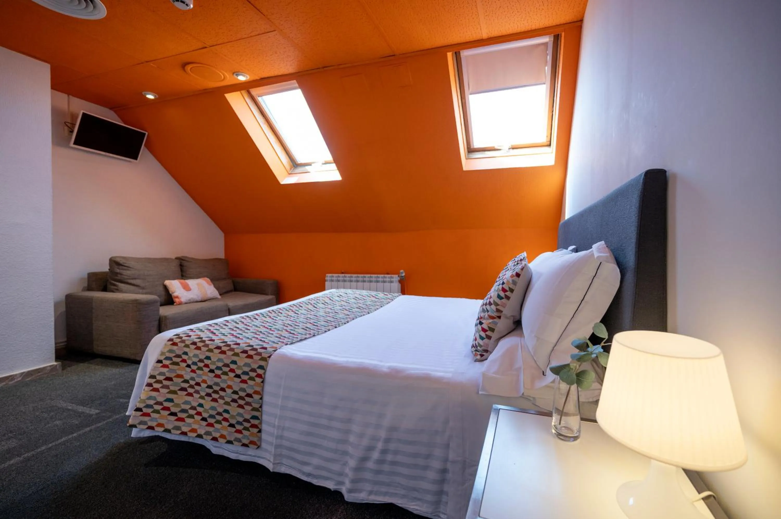 Communal lounge/ TV room, Bed in Apartamentos G3 Galeon