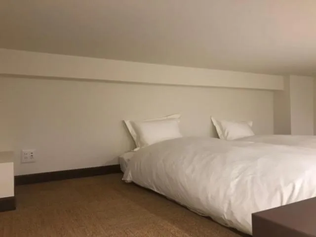 Bedroom, Bed in COFFEE HOTEL Soundwave