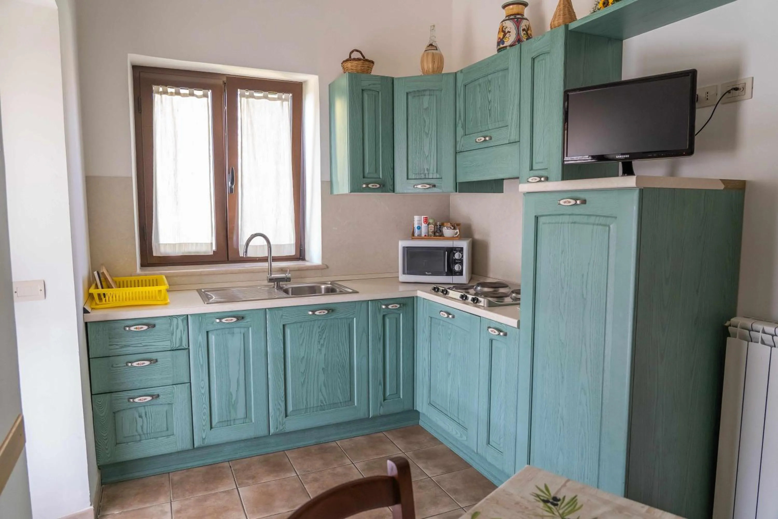 Kitchen or kitchenette in Agriturismo Bella Cima