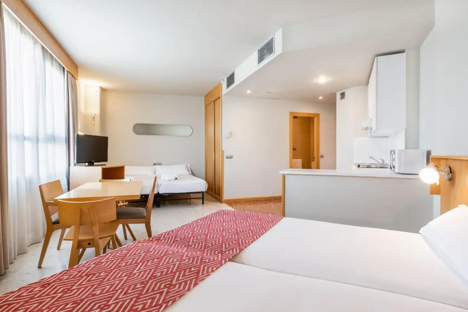 Photo of the whole room, Bed in Aparthotel Exe Campus San Mamés Photo of the whole room, Bed in Aparthotel Exe Campus San Mamés